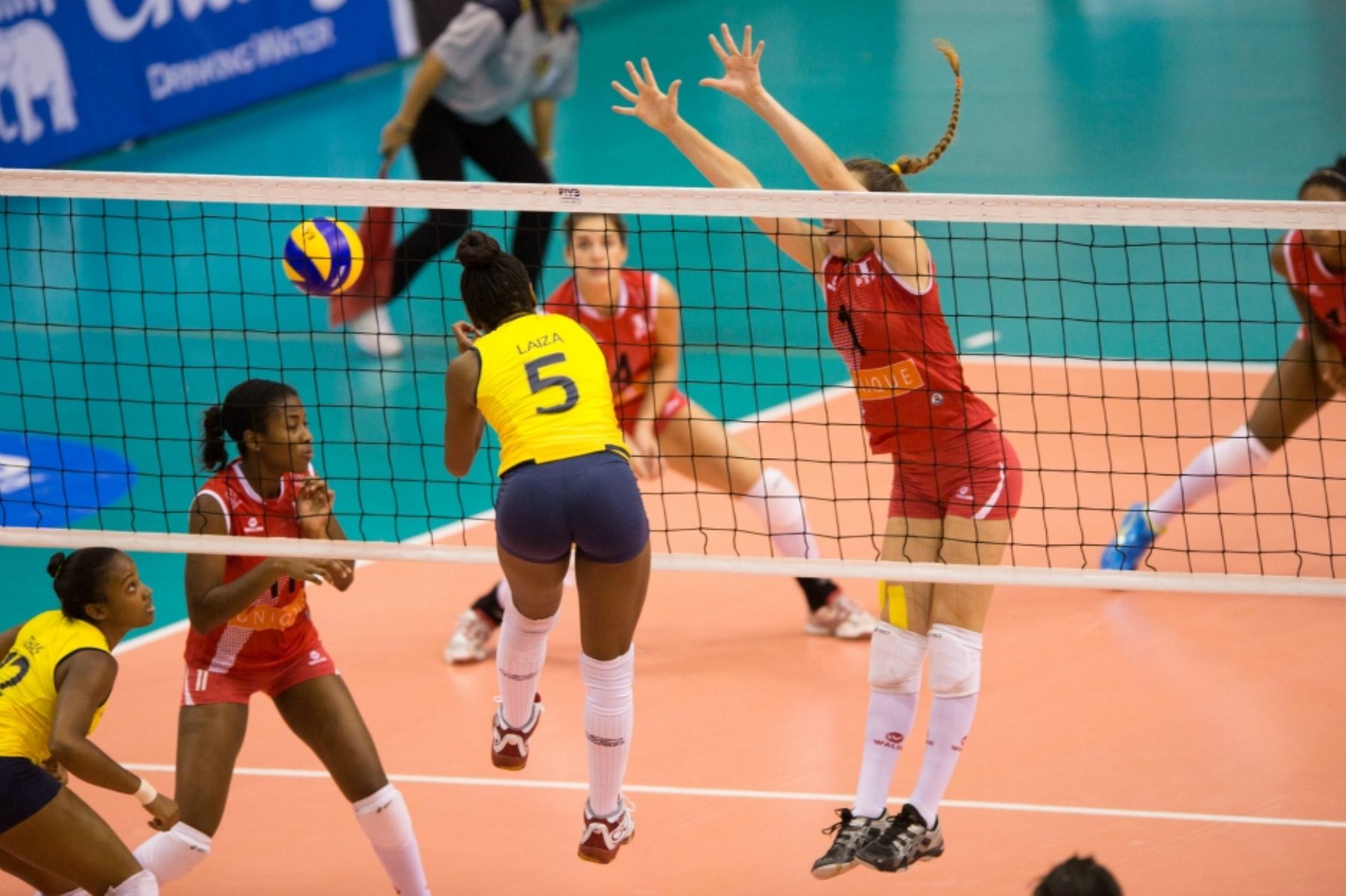 Peru players (red t-shirt) during the bronze medal match against Brazil at FIVB Girls