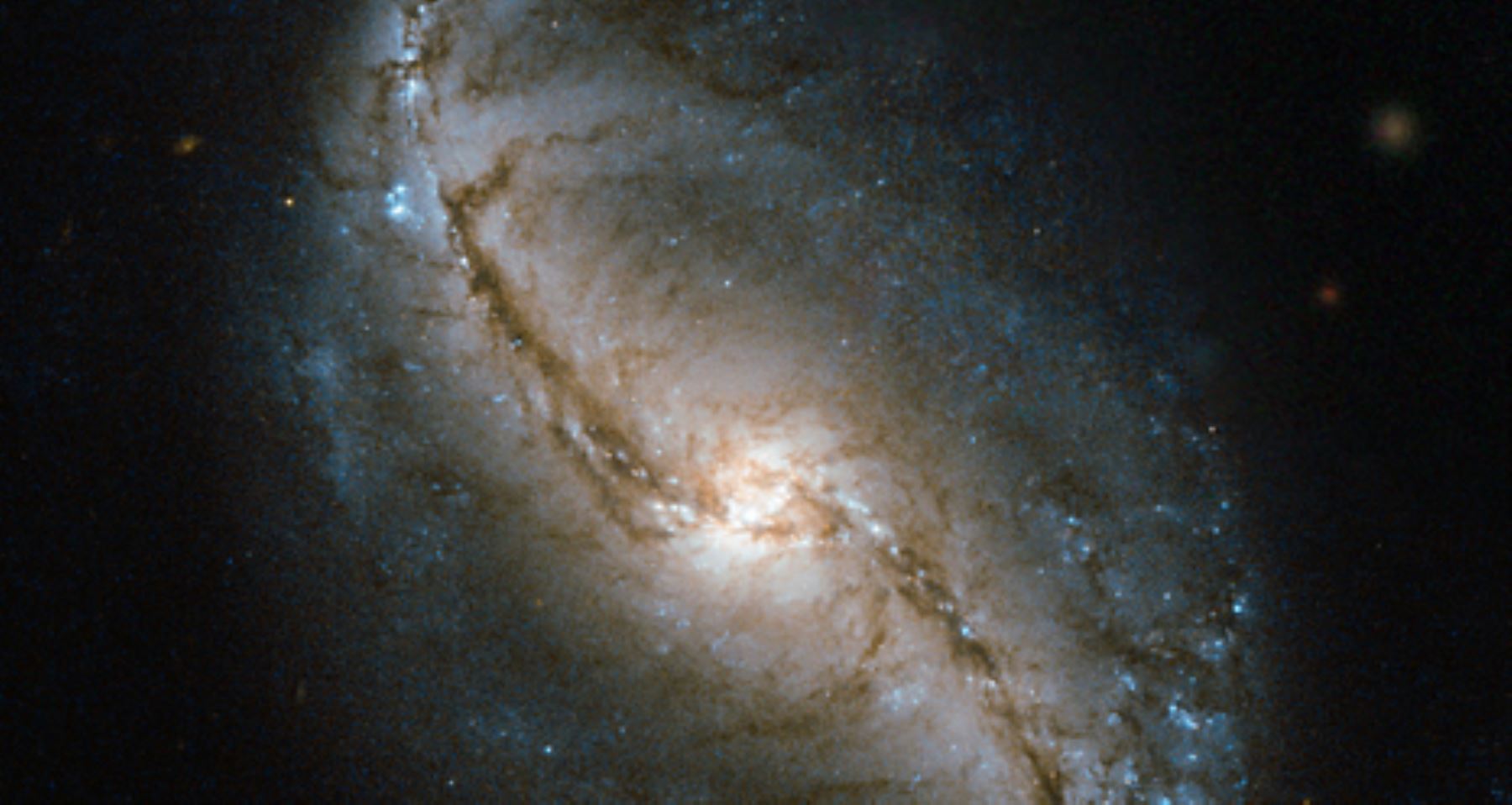 Imagen de galaxia espiral NGC 986. Foto: NASA