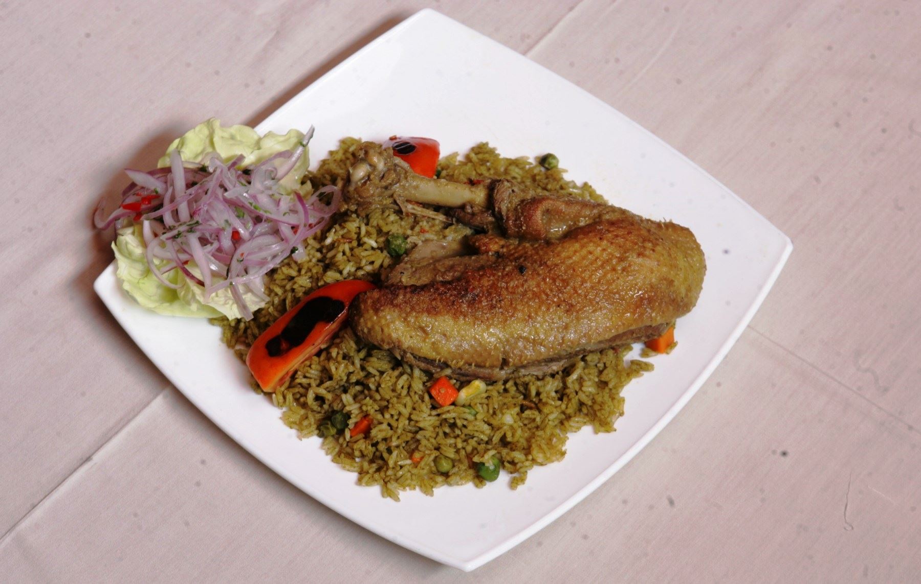 El arroz con pato es uno de los platos emblemáticos de la cocina lambayecana. ANDINA/Archivo