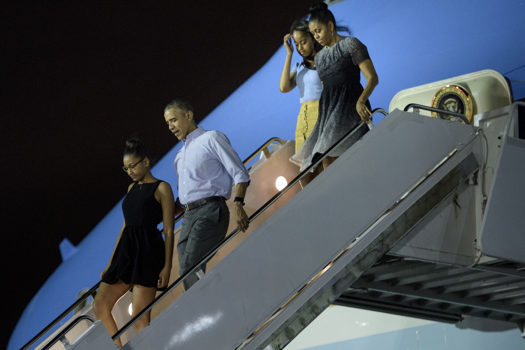 Obama de vacaciones navideñas en su ciudad natal hawaiana con su familia. Foto: AFP