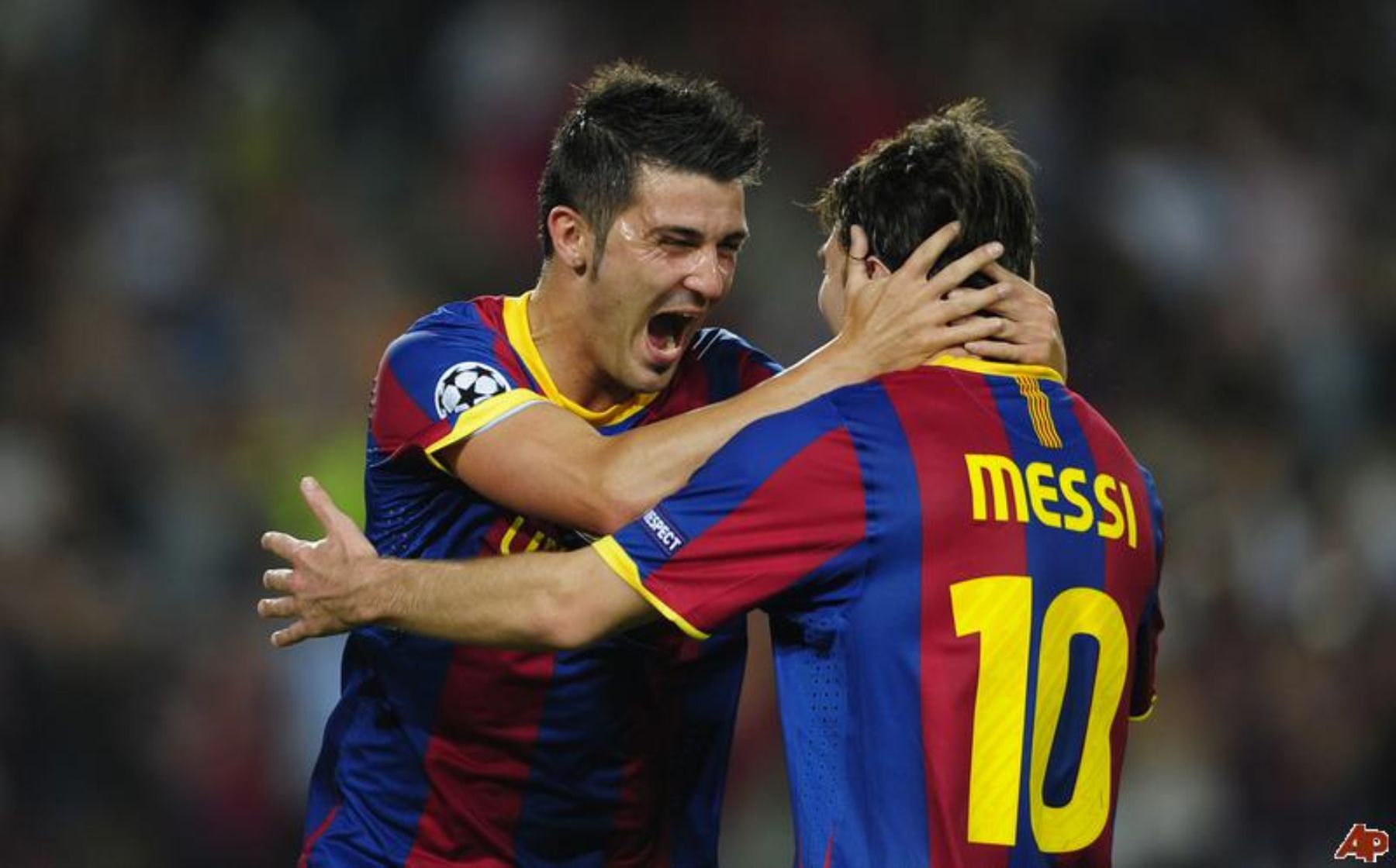 David Villa y Lionel Messi celebran el triunfo de Barcelona.