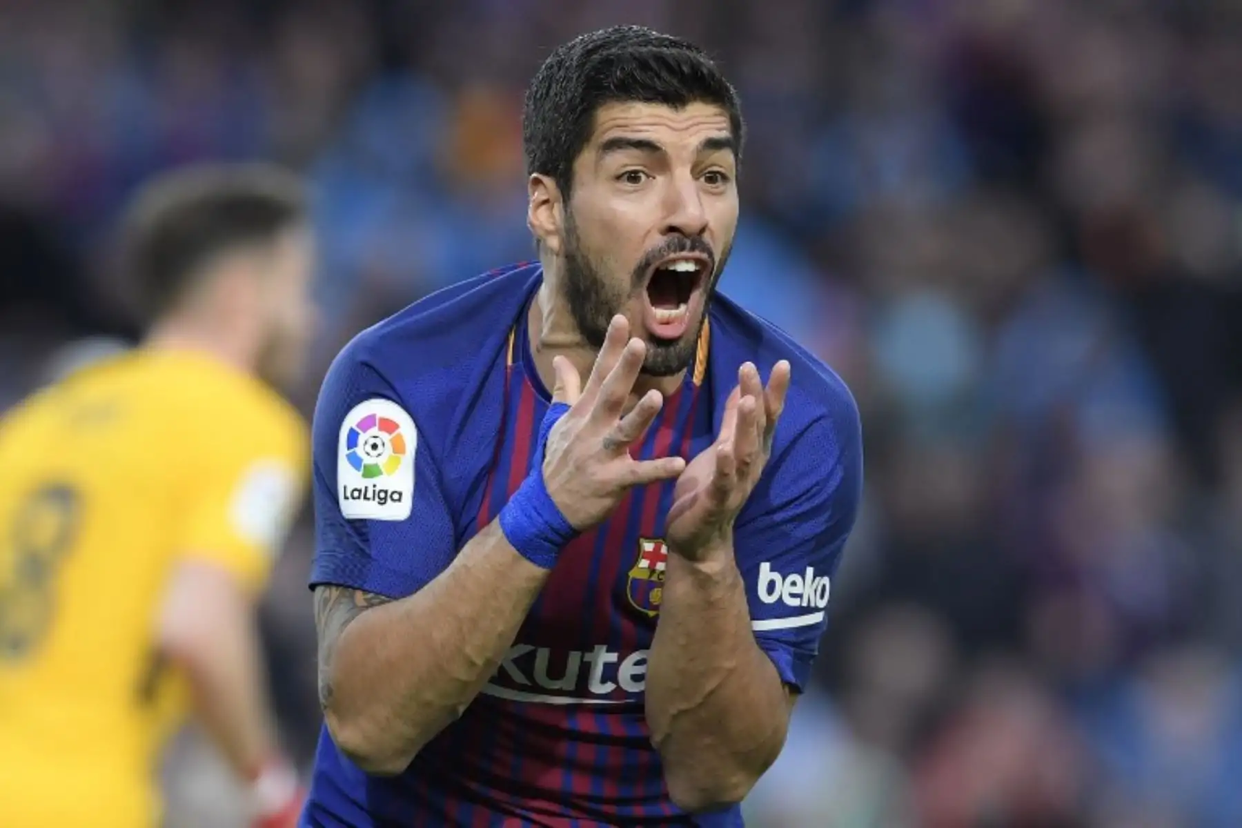 El delantero uruguayo del Barcelona Luis Suárez reacciona durante el partido de fútbol de la liga española FC Barcelona contra el Club Atlético de Madrid en el estadio Camp Nou de Barcelona.Foto:AFP
