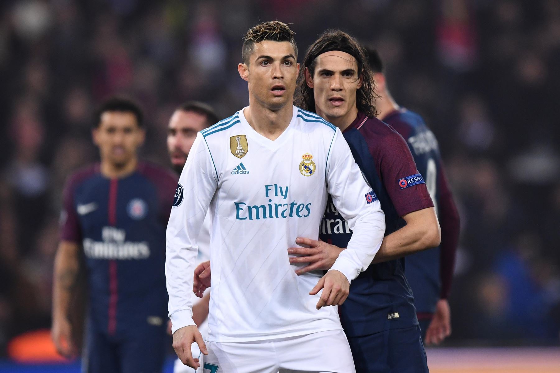 El delantero portugués del Real Madrid Cristiano Ronaldo y el delantero uruguayo Edinson Cavani del Paris Saint-Germain. Foto: AFP