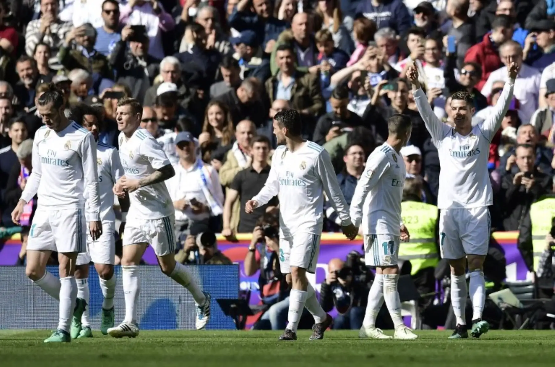 Cristiano Ronaldo celebra un gol durante el partido de fútbol de la liga española entre el Real Madrid CF y el Club Atlético de Madrid .Foto:AFP