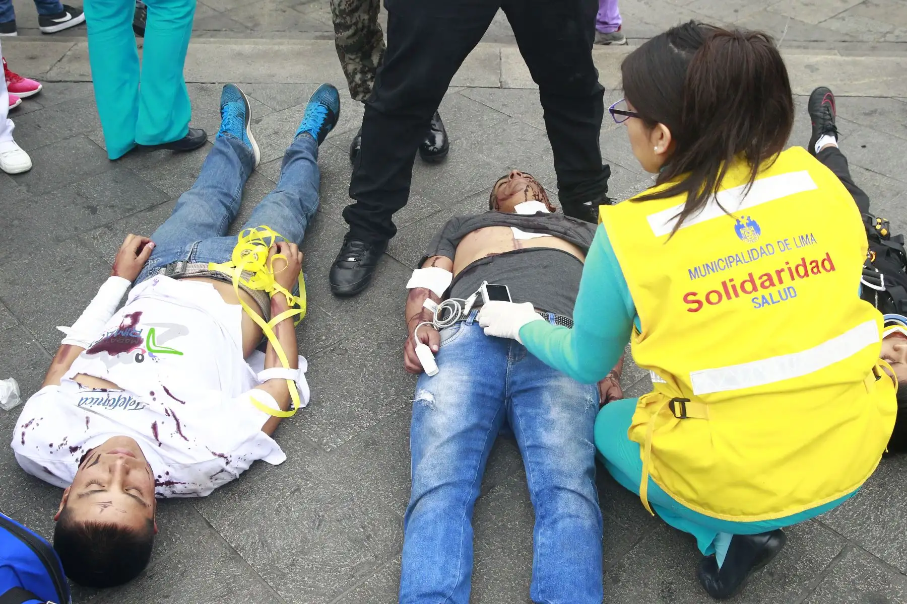 Enfermeras del hospital de la Solidaridad colaboran en las acciones de atención médica durante el Simulacro en el Centro Histórico de Lima, en la plaza San Martín. Foto: ANDINA/Eddy Ramos.