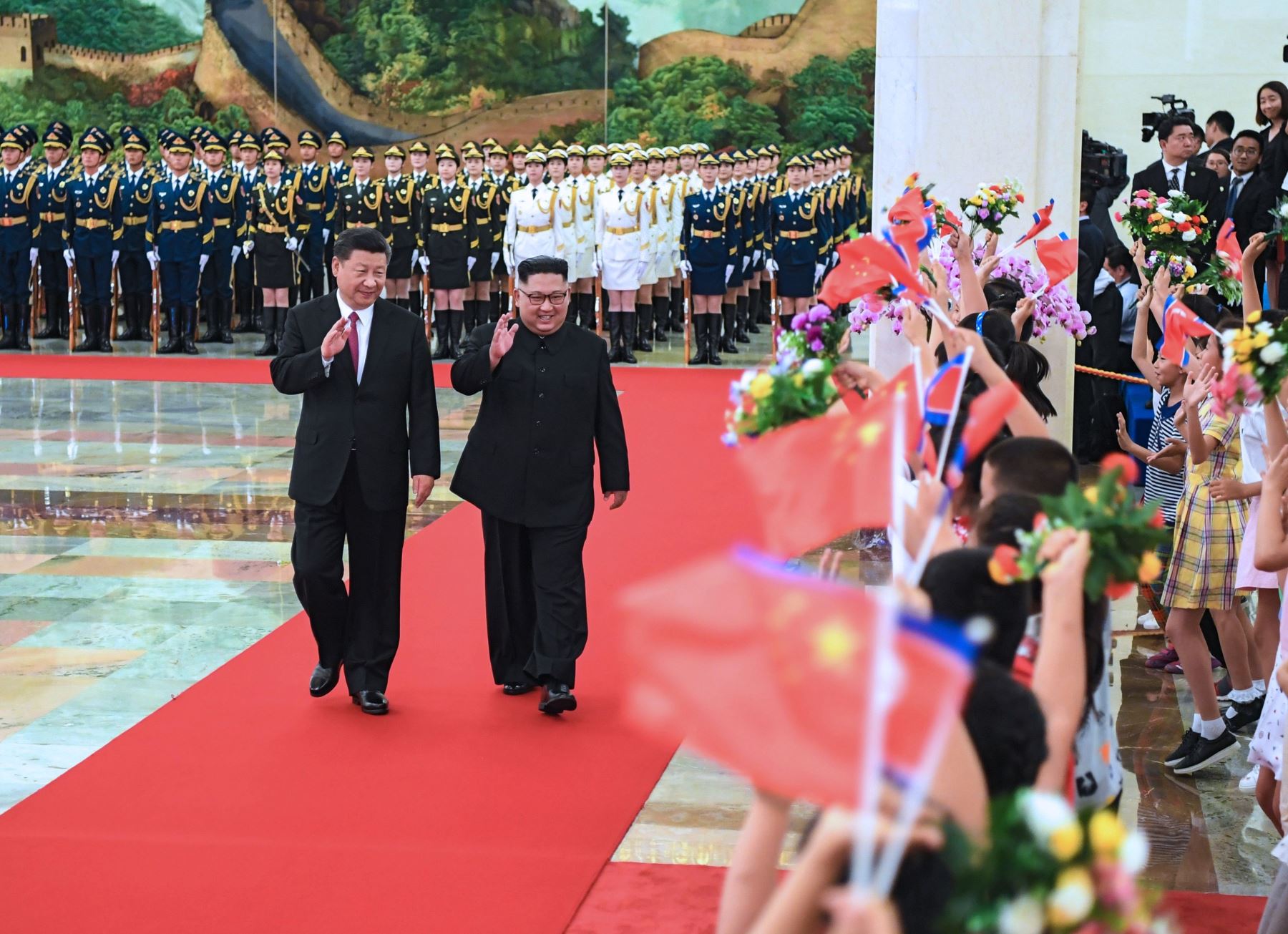 Líder norcoreano Kim Jong Un y presidente chino Xi Jinping Foto: AFP