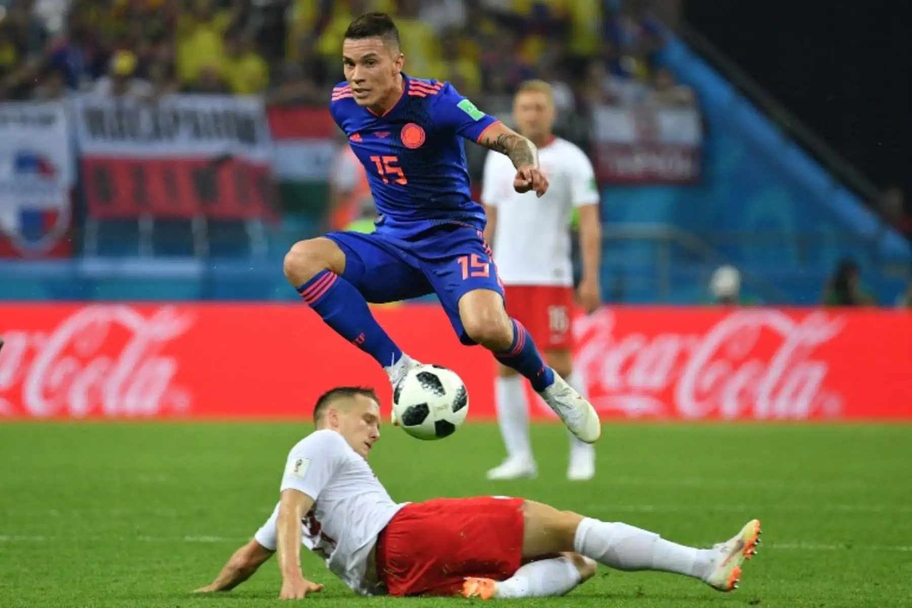 El centrocampista colombiano Mateus Uribe salta mientras controla el balón durante el partido de fútbol del Grupo H de la Copa Mundial Rusia 2018 entre Polonia y Colombia .Foto:AFP