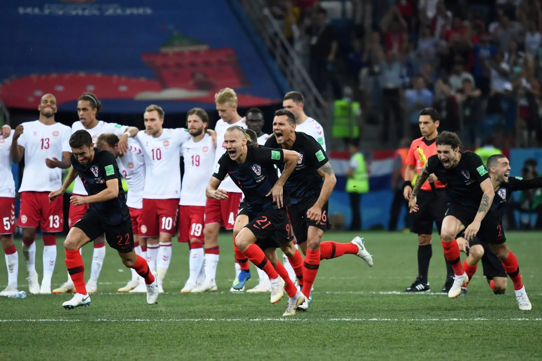 Los jugadores de Croacia celebran después de ganar la ronda de octavos de final de la Copa Mundial Rusia 2018 entre Croacia y Dinamarca en el Estadio Nizhny Novgorod en Nizhny Novgorod el 1 de julio de 2018.
Dimitar DILKOFF / AFP