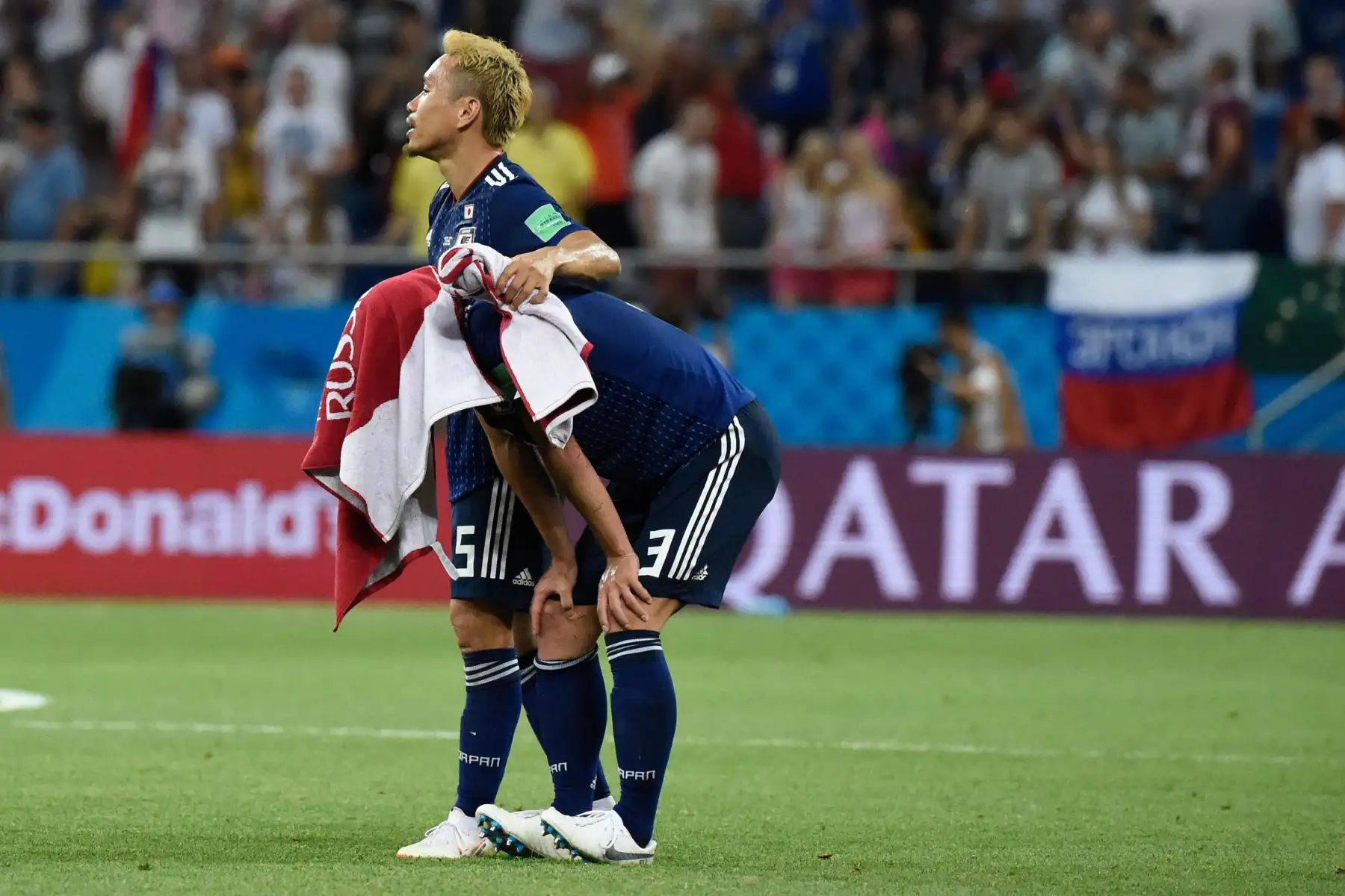 Los jugadores de Japón reaccionan a su derrota durante la ronda de octavos de final de la Copa Mundial Rusia 2018 entre Bélgica y Japón en el Rostov Arena en Rostov-On-Don el 2 de julio de 2018. / AFP