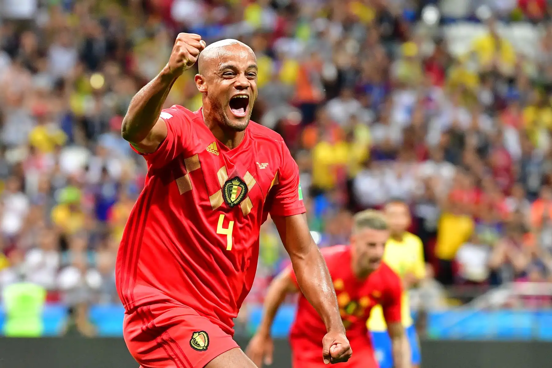 El defensor de Bélgica Vincent Kompany celebra después de que Brasil anotó un gol en el partido de cuartos de final de la Copa del Mundo Rusia 2018 entre Brasil y Bélgica en el Kazan Arena en Kazán el 6 de julio de 2018. / AFP