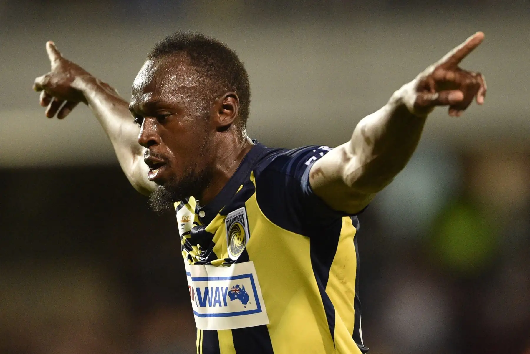 El velocista olímpico Usain Bolt celebra su primer gol con sus compañeros del club de fútbol A-League Central Coast Mariners en su primer inicio competitivo para el club contra Macarthur South West United en Sydney el 12 de octubre de 2018. AFP
