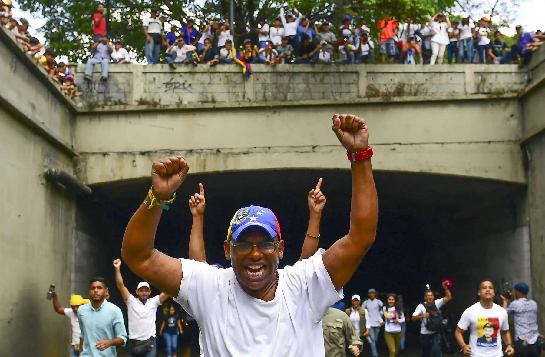 Simpatizantes del líder opositor venezolano y autoproclamado presidente interino Juan Guaido, se manifiestan en Caracas. AFP