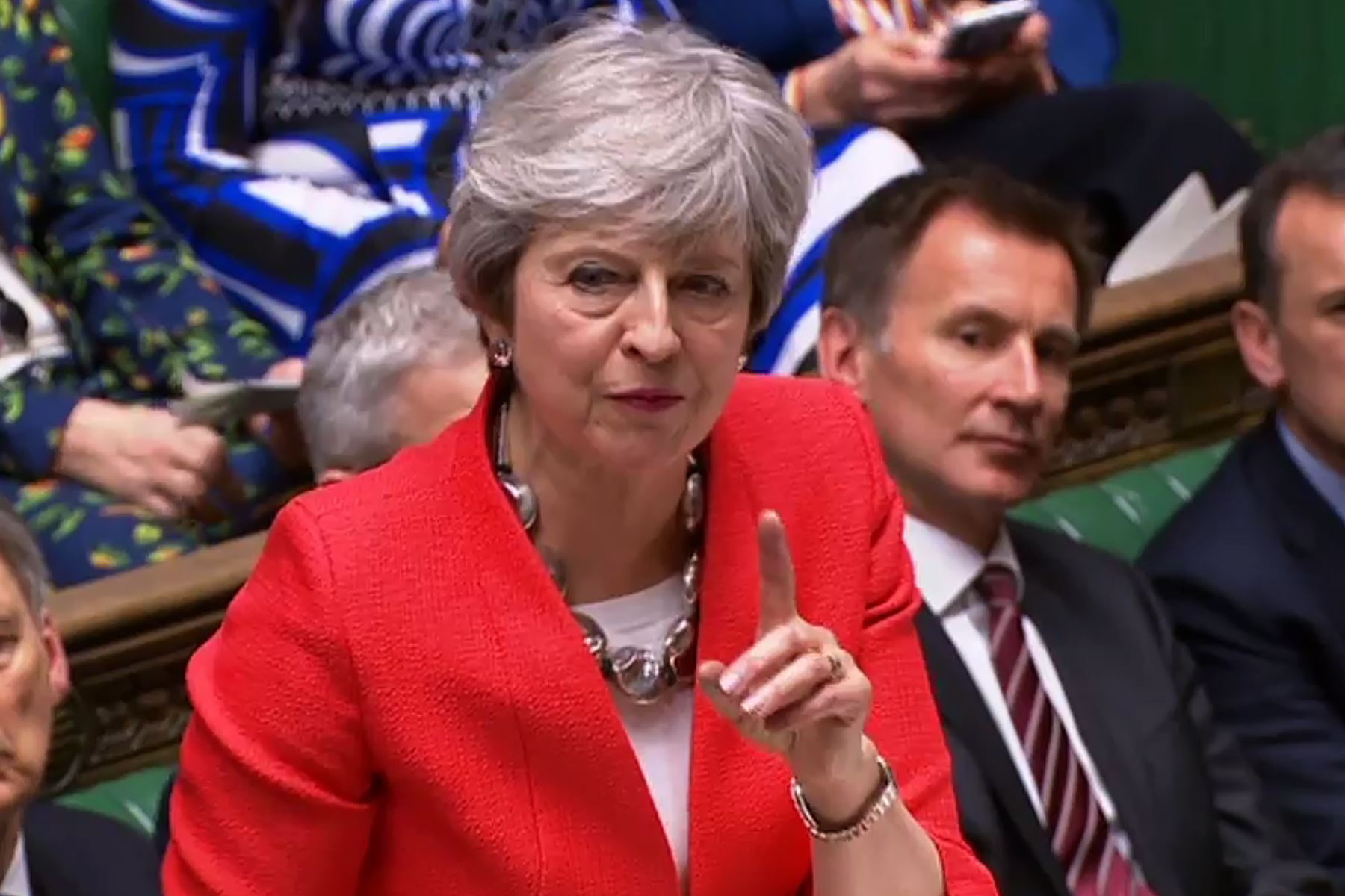 La primera ministra británica, Theresa May, habla al inicio del debate sobre el segundo voto significativo en el acuerdo "brexit", en la Cámara de los Comunes, en Londres, el 12 de marzo del 2019. Foto: AFP.