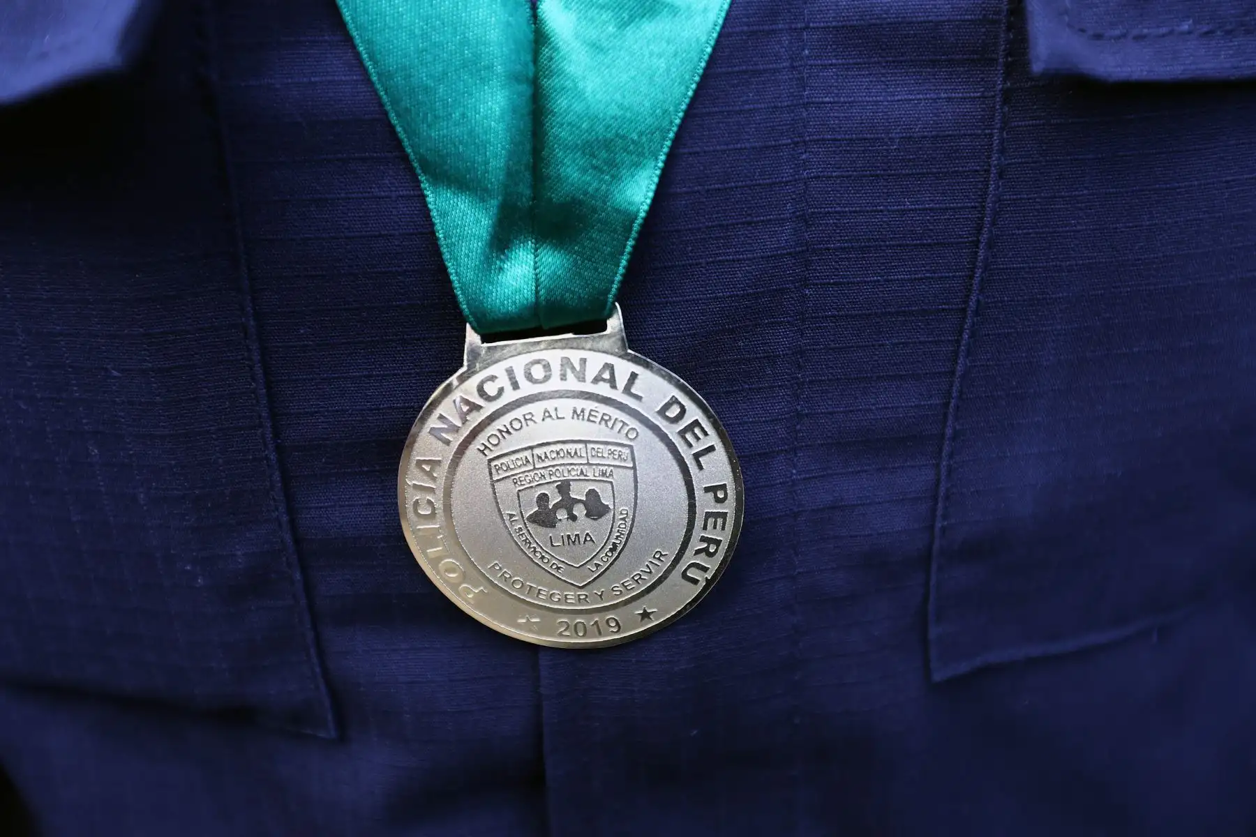 El Gral. PNP Mario Arata Bustamante, jefe de la Región Policial Lima preside la ceremonia de Premiación de 21 efectivos policiales por haber participado en intervenciones meritorias, durante el mes de enero. Foto: ANDINA/Norman Córdova