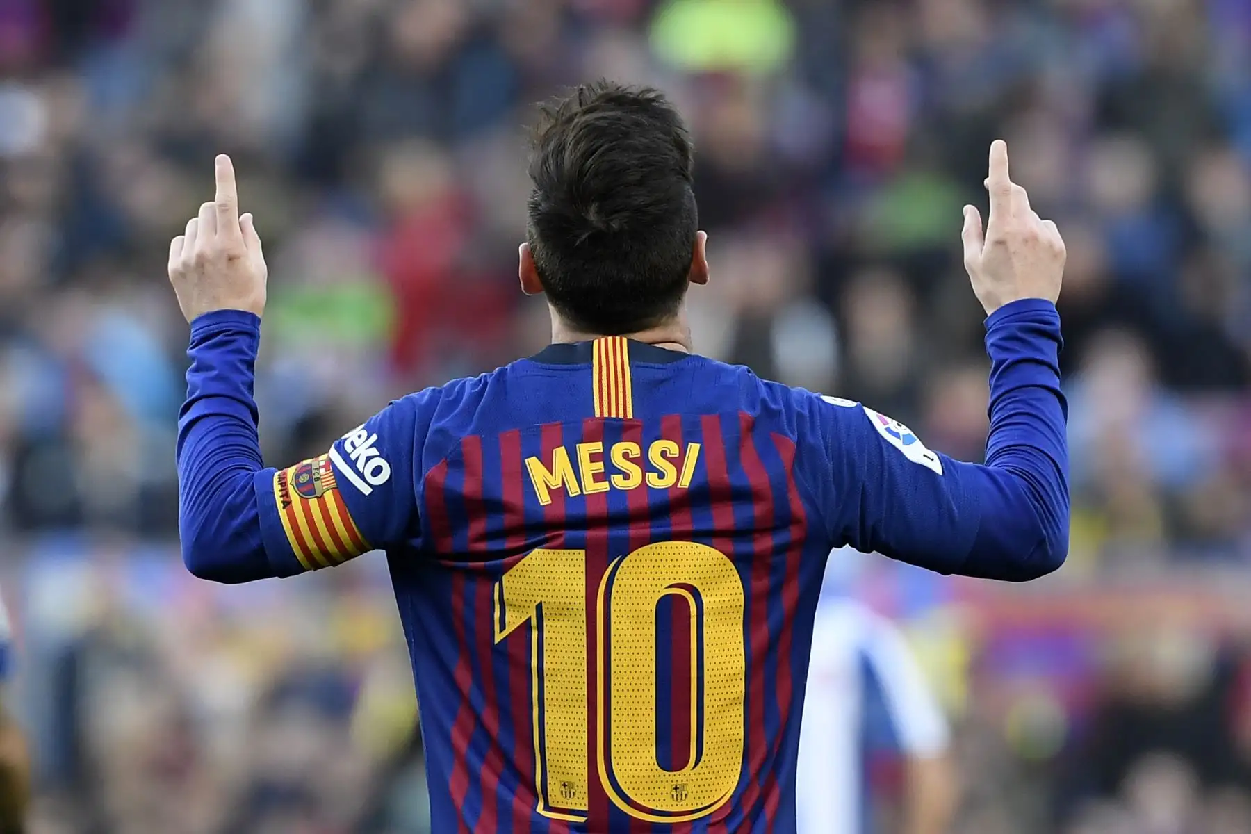El delantero argentino de Barcelona, Lionel Messi, celebra su segundo gol durante el partido de fútbol de la liga española entre el FC Barcelona y el RCD Espanyol.Foto: AFP