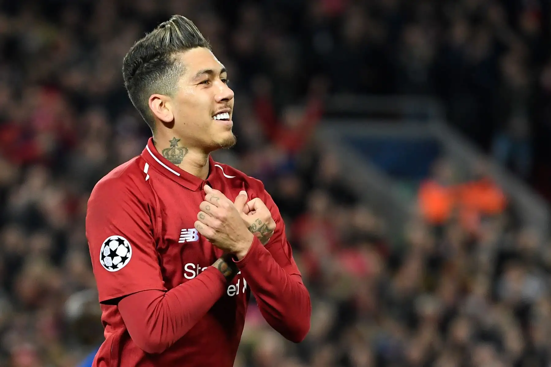 El centrocampista brasileño del Liverpool, Roberto Firmino, celebra después de marcar un gol durante los cuartos de final de la Liga de Campeones de la UEFA, partido de fútbol de ida entre el Liverpool y el FC Porto.Foto:AFP