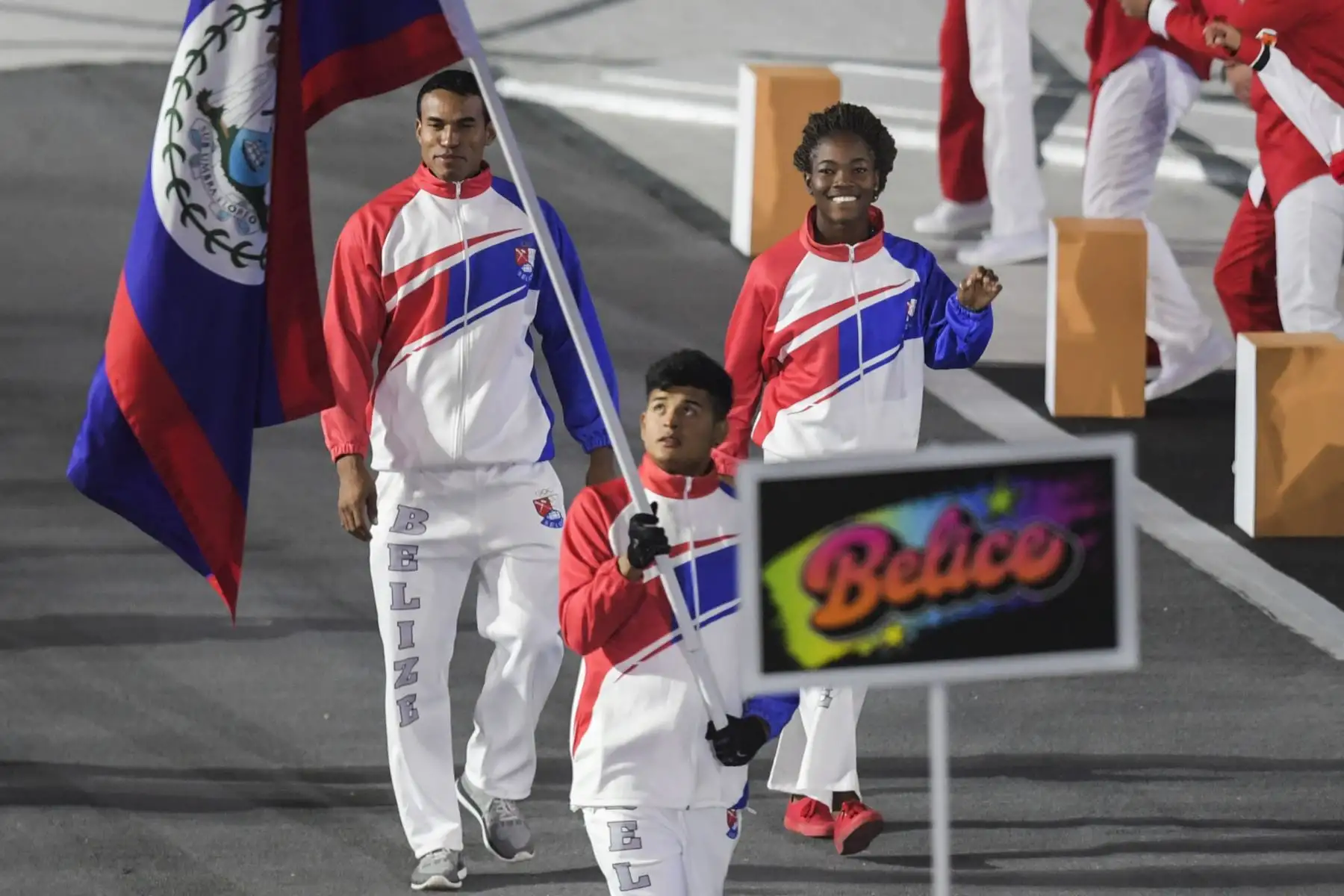 Miembros de la delegación de Belice participan en el Desfile de las Naciones durante la ceremonia de apertura de los Juegos Panamericanos de Lima 2019 en el Estadio Nacional de Lima.Foto.AFP
