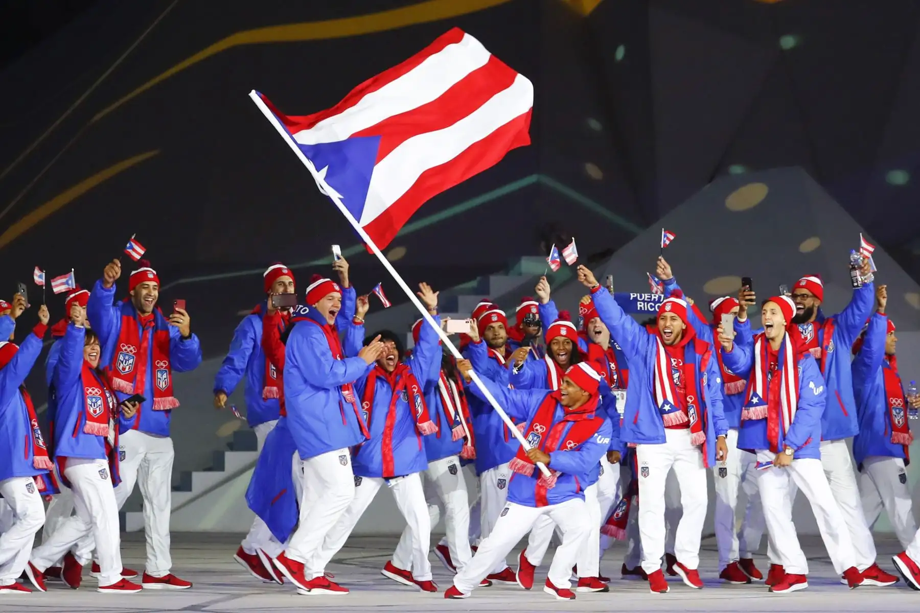 La delegación de Puerto Rico está encabezada por el atleta Franklin Gómez durante la ceremonia de apertura de los Juegos Panamericanos, Lima 2019 en el Estadio Nacional. 
Foto: ANDINA/ Lima 2019