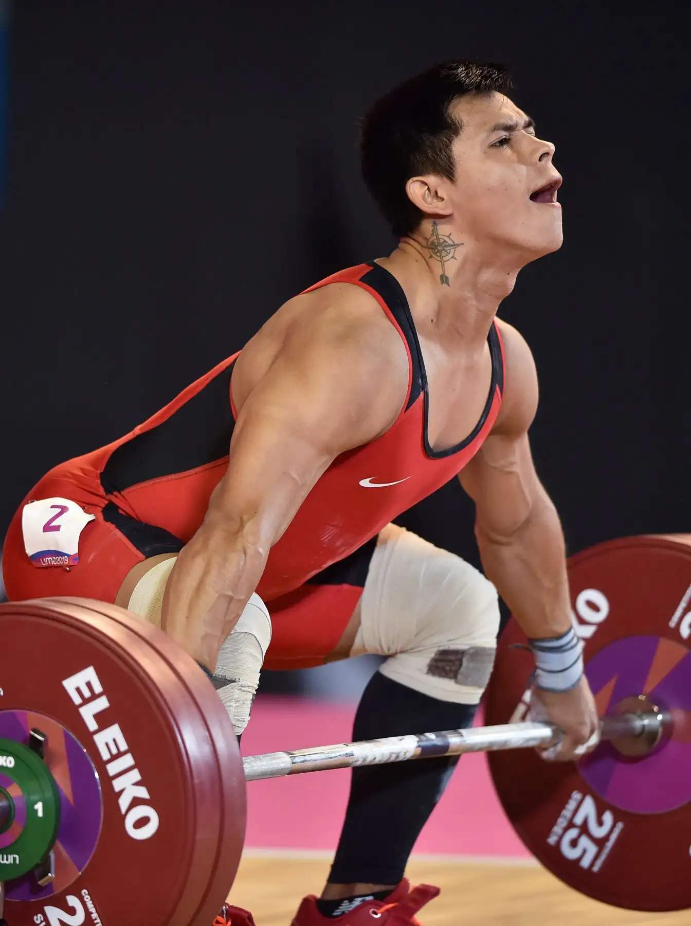 Luis David Bardalez, de Perú, logra la medalla de bronce en la disciplina  Levantamiento de pesas de los Juegos Panamericanos de Lima 2019.
Foto: AFP