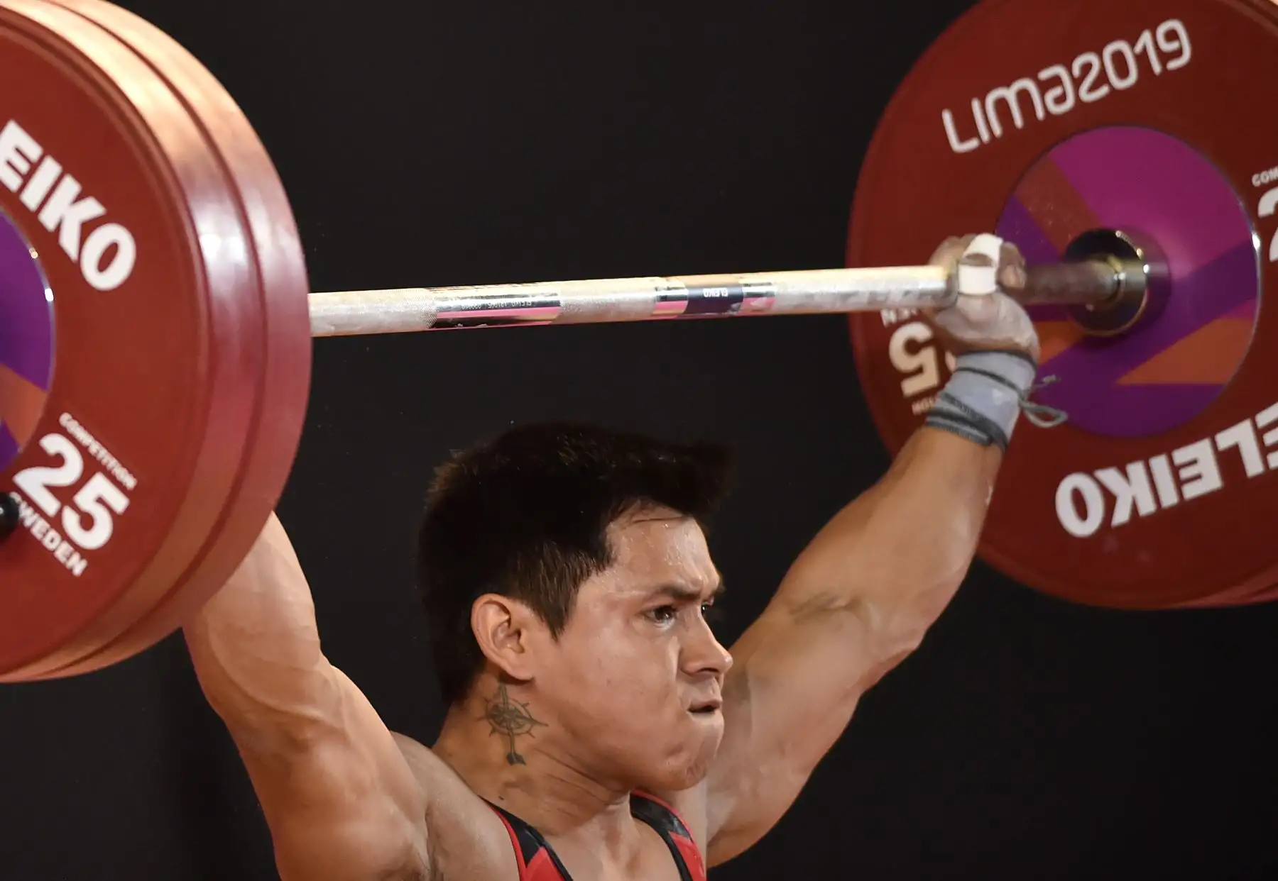 Luis David Bardalez, de Perú, logra la medalla de bronce en la disciplina  Levantamiento de pesas de los Juegos Panamericanos de Lima 2019.
Foto: AFP