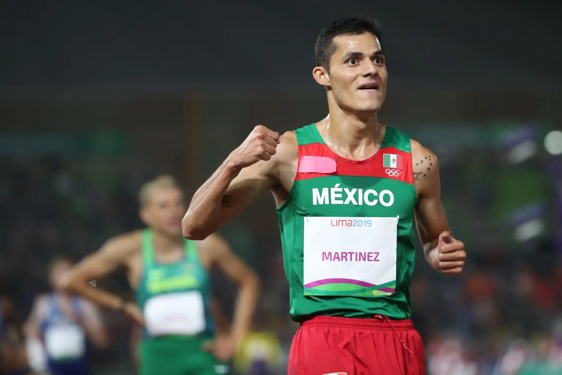 Fernando Martínez de México celebra al ganar la prueba 5000 metros masculino en atletismo en los Juegos Panamericanos Lima 2019.
Foto: EFE