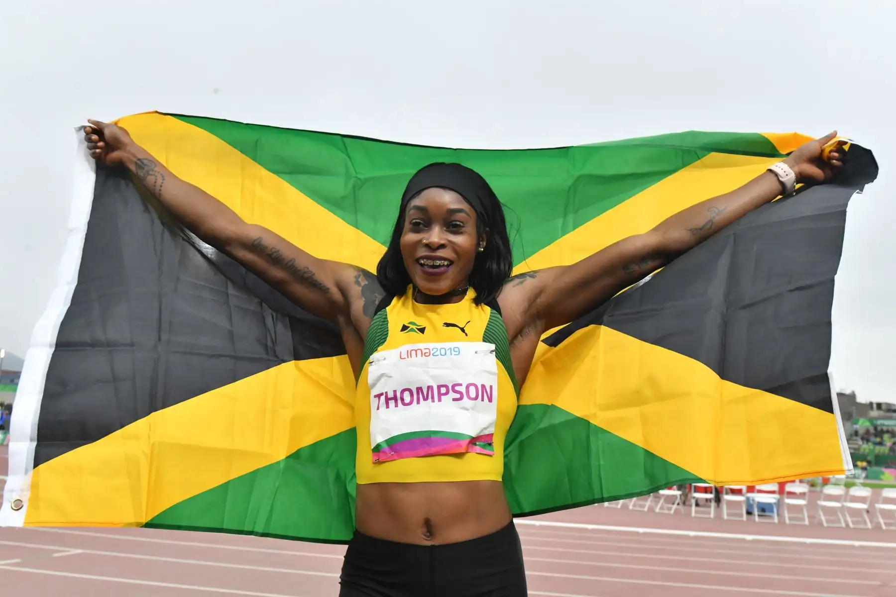 La jamaicana Elaine Thompson celebra ganar la final de los 100 metros femeninos de atletismo durante los Juegos Panamericanos de Lima 2019.
Foto: AFP