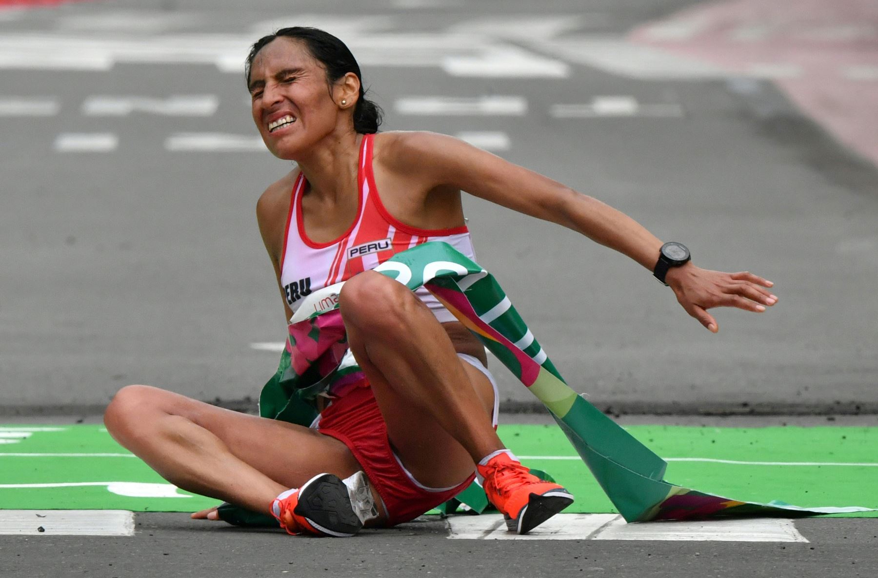 La peruana Gladys Tejeda reacciona después de ganar el maratón femenino en los Juegos Panamericanos Lima 2019. AFP