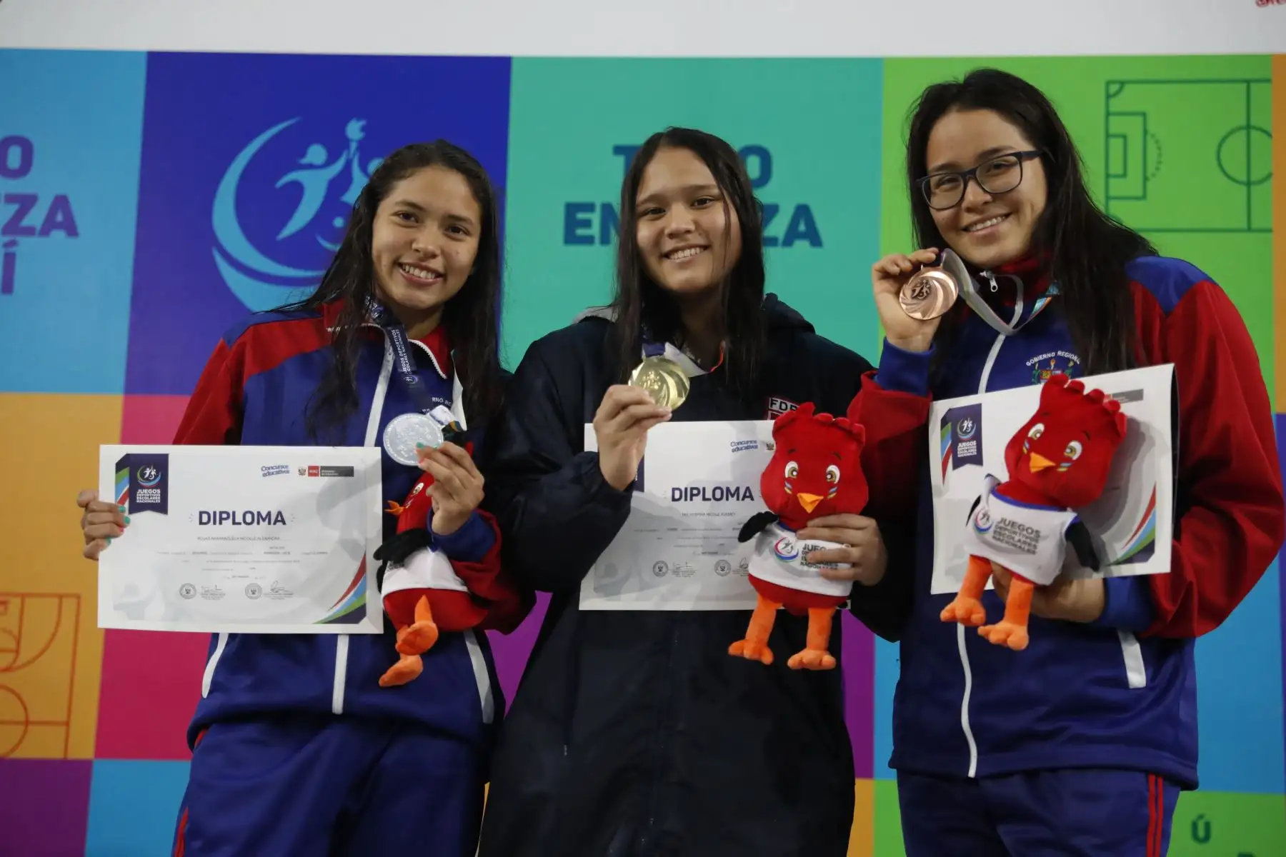 Nicole Tay Hospina  del Colegio La Salle de Lima gana la medalla de oro Mariposa 100m. por  los Juegos Deportivos Escolares Nacionales en el Centro Acuático de la Videna.Foto: ANDINA/ Carlos Lezama