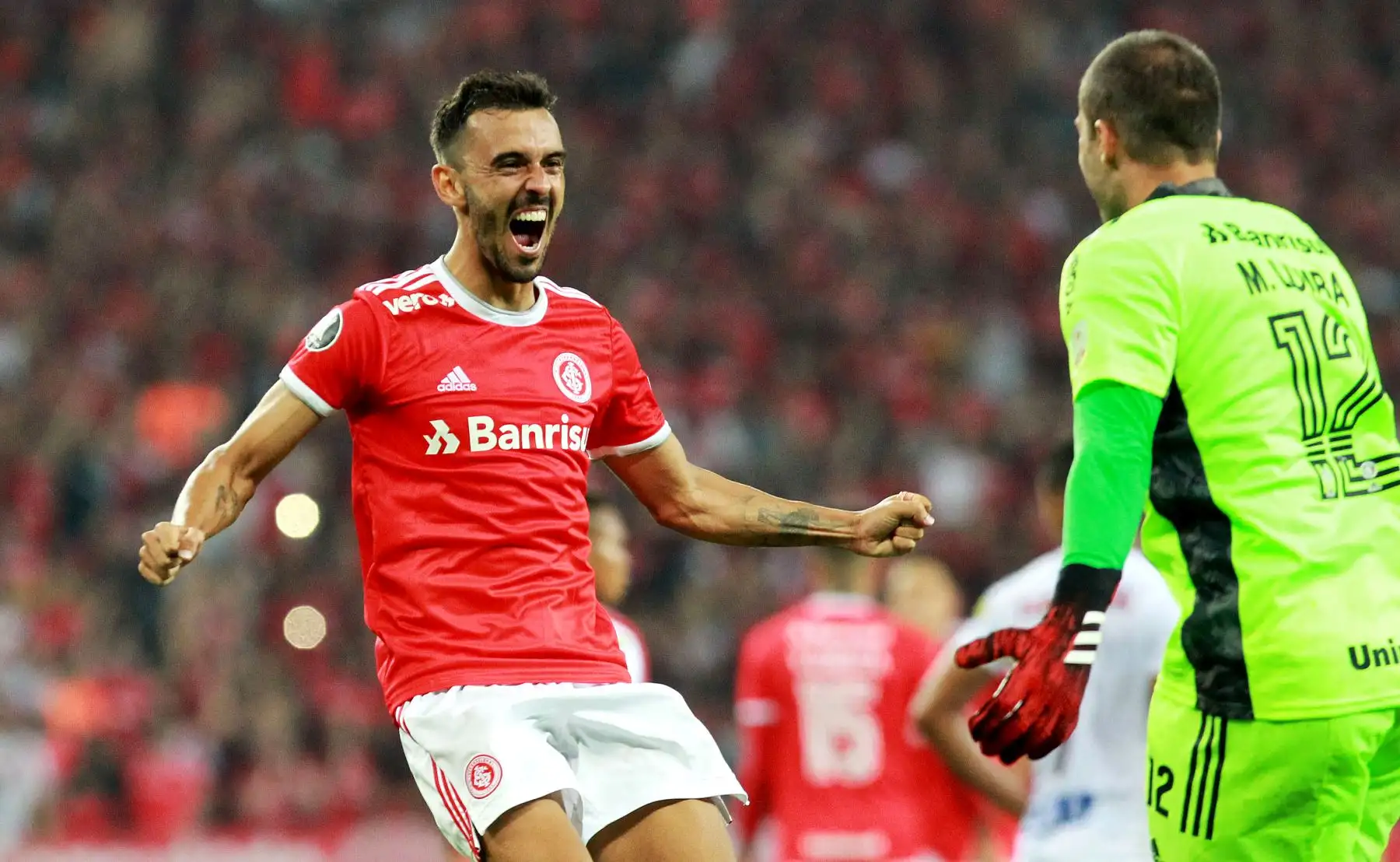 Uendel y Marcelo Lomba del Internacional de Brasil celebran después de ganar su partido de fútbol Copa Libertadores 2020 contra el Tolima de Colombia.
Foto: AFP