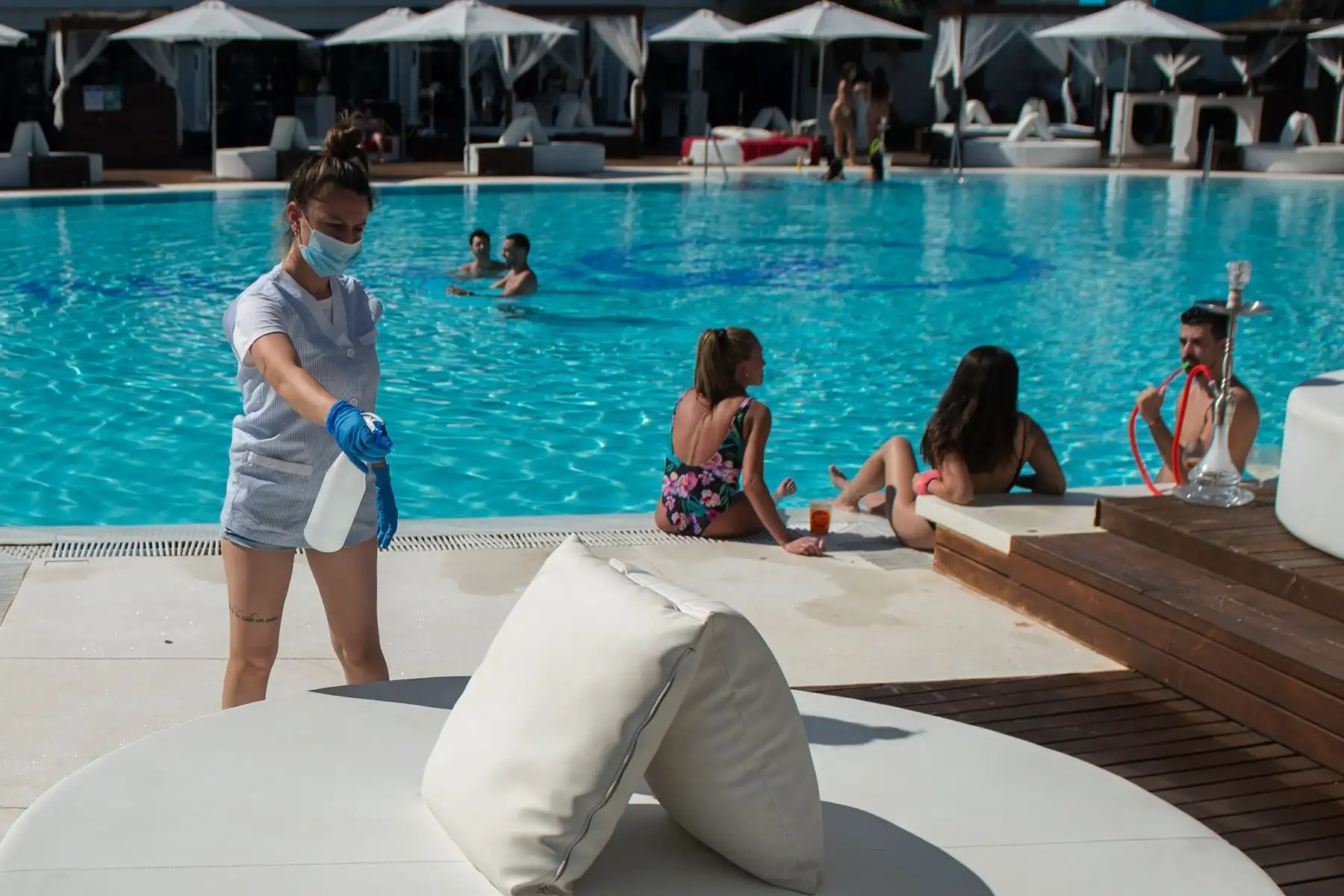Una semana después de la reapertura de tiendas, bares y restaurantes, los italianos pueden regresar a los gimnasios, pero pidiendo cita previa. Foto: AFP