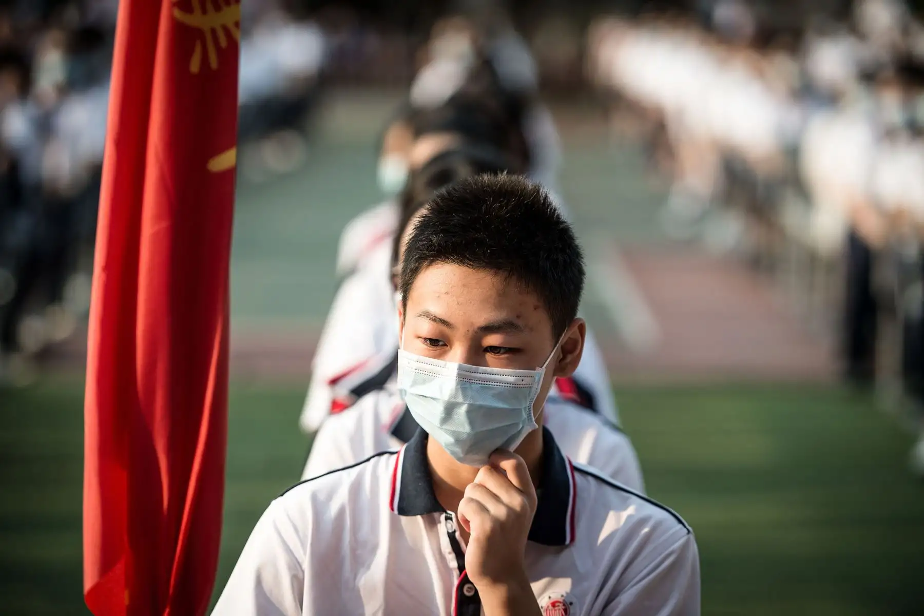 Los estudiantes asisten al centenario de la fundación de la escuela secundaria de Wuhan en el primer día del nuevo semestre en Wuhan, en la provincia central de Hubei de China.
Foto: AFP