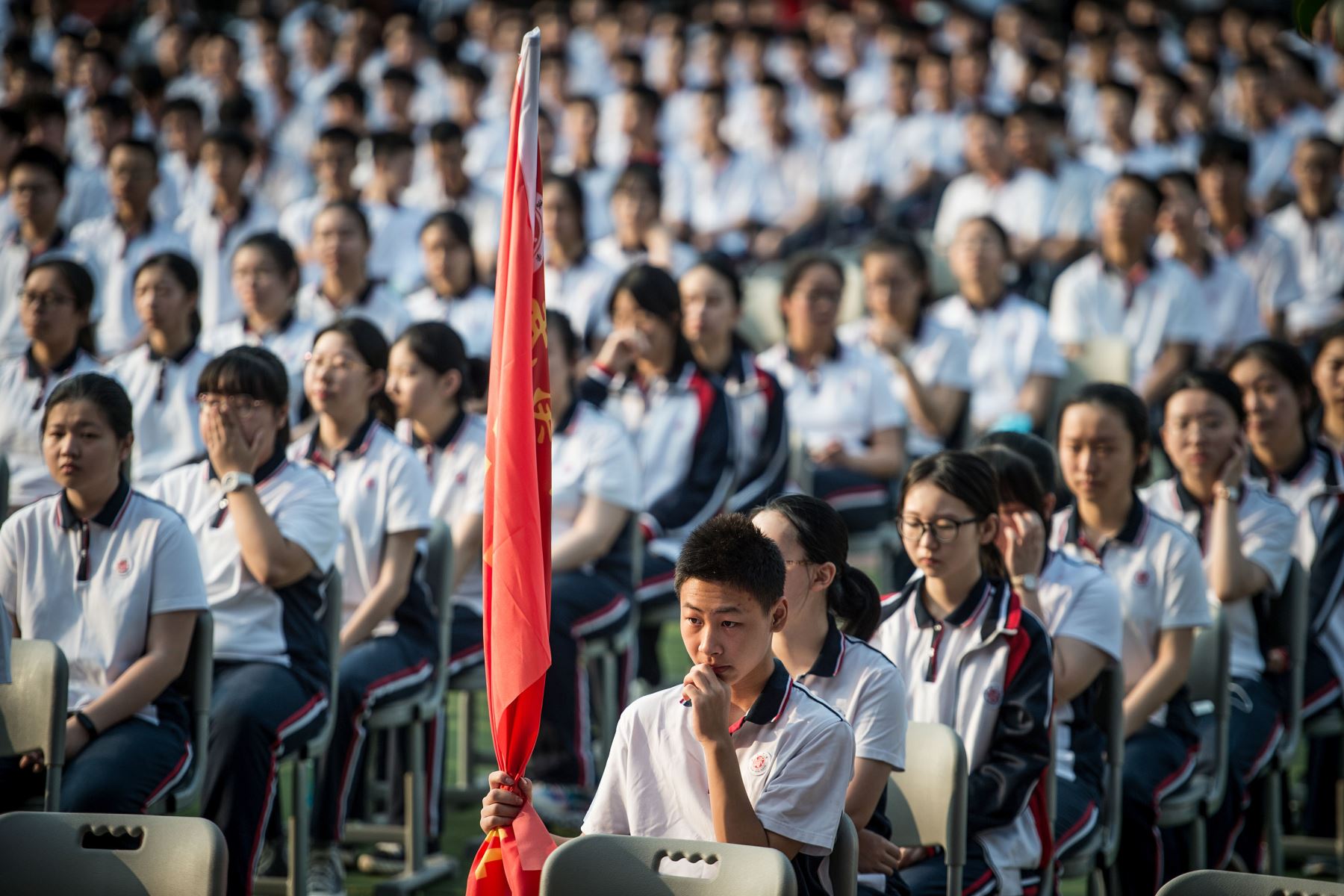 Los estudiantes asisten al centenario de la fundación de la escuela secundaria de Wuhan en el primer día del nuevo semestre en Wuhan, en la provincia central de Hubei de China.
Foto: AFP