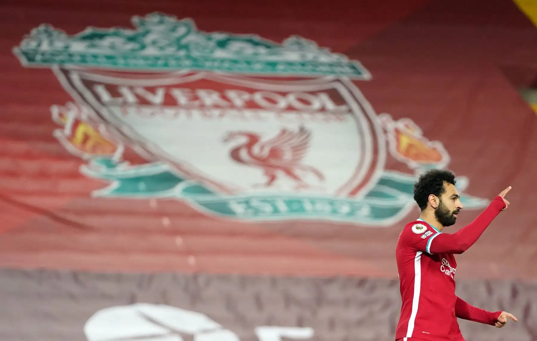 El mediocampista egipcio del Liverpool, Mohamed Salah, celebra su primer gol para igualar 1-1 durante el partido de fútbol de la Premier League. Foto: AFP