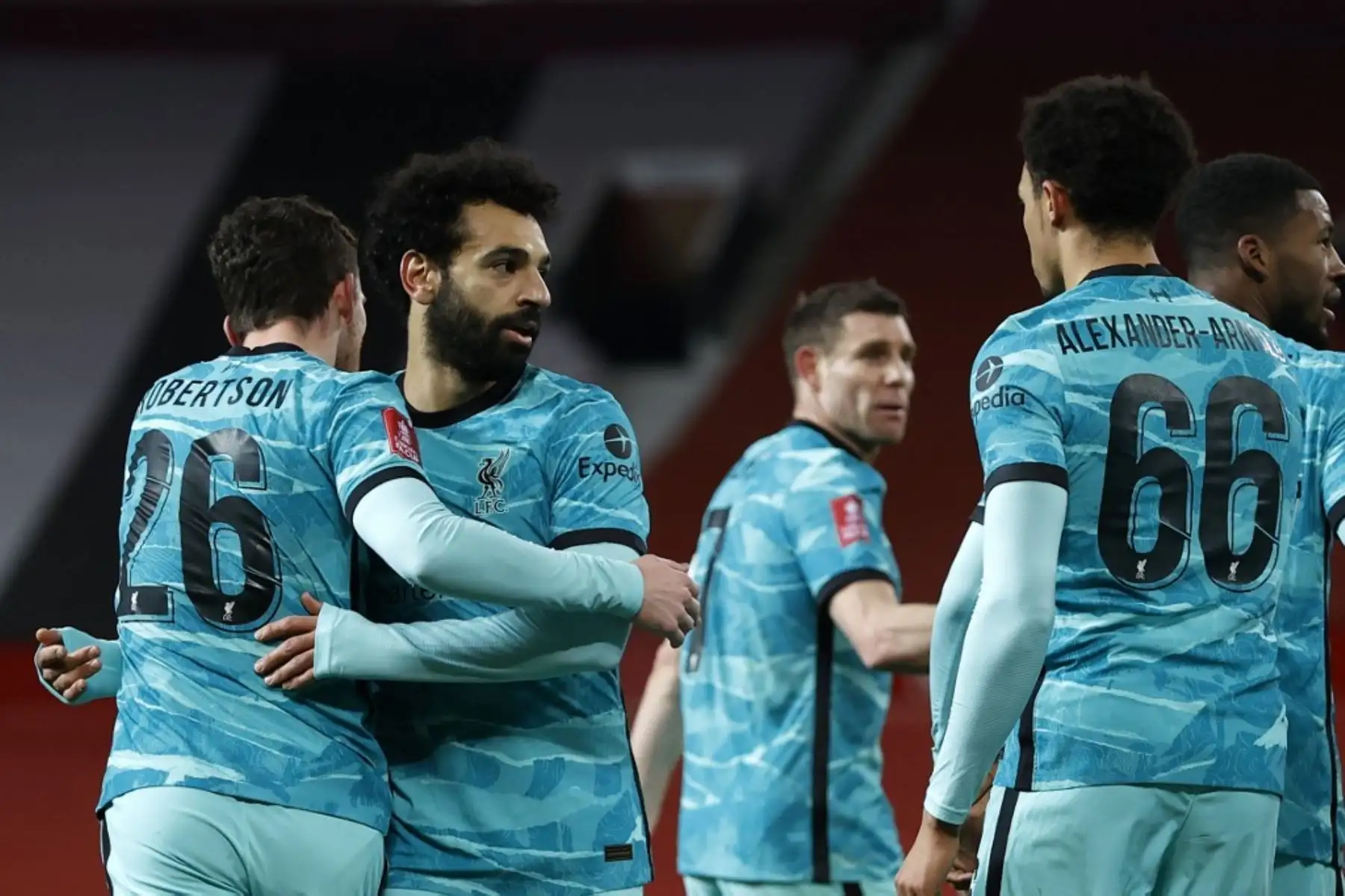 El centrocampista egipcio del Liverpool Mohamed Salah celebra anotar el primer gol de su equipo durante la cuarta ronda de la Copa FA inglesa del partido de fútbol entre el Manchester United y el Liverpool en Old Trafford en Manchester. Foto: AFP