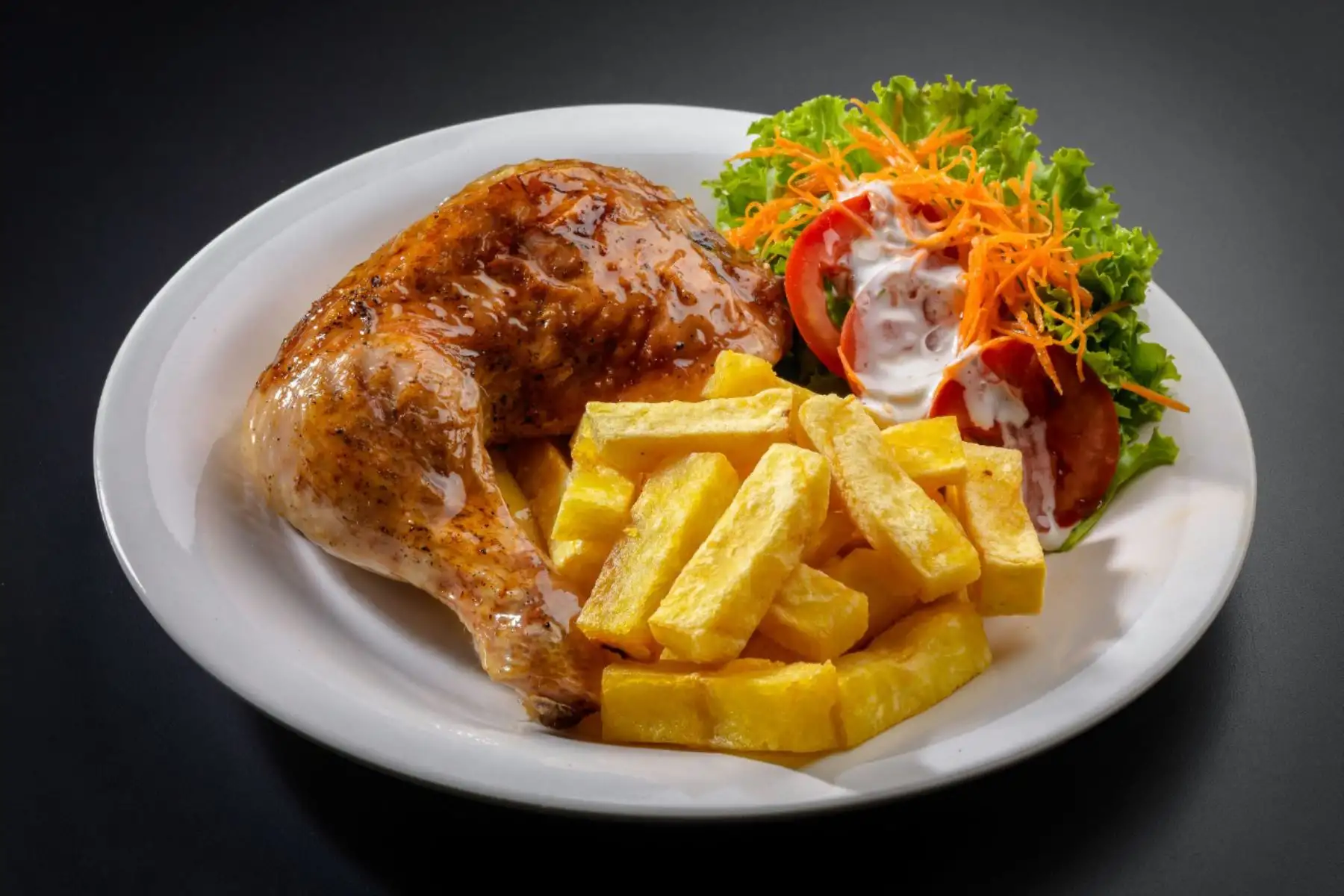 Pollo a la brasa en presentación personal de 1/4. ANDINA/Difusión