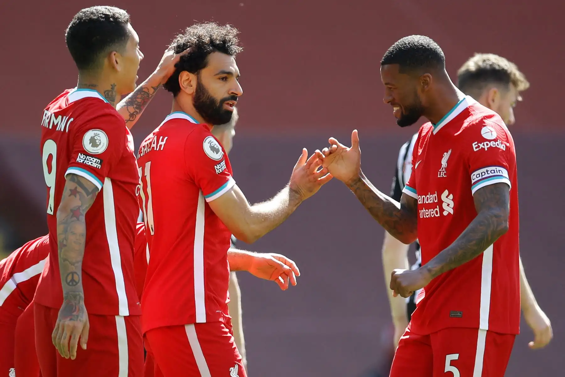 El centrocampista egipcio del Liverpool Mohamed Salah  celebra el gol de apertura durante el partido de fútbol de la Premier League inglesa entre el Liverpool y el Newcastle.
Foto: AFP