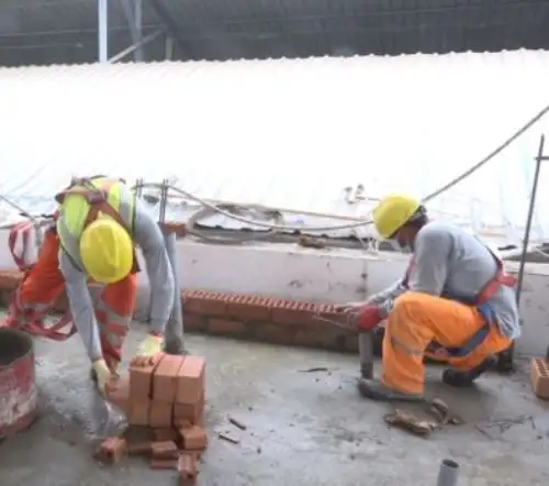Trabajadores de construcción.