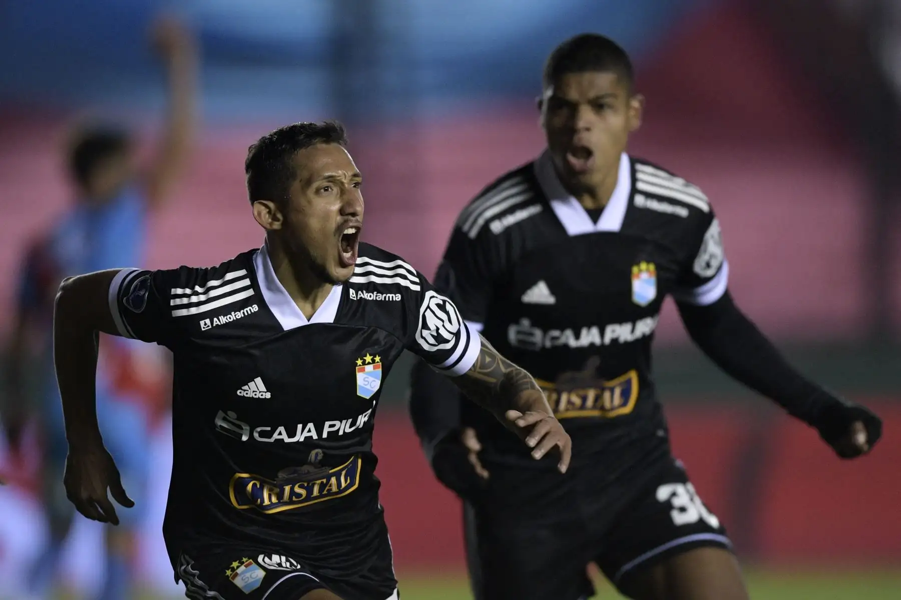 El Sporting Cristal Christofer Gonzales de Perú celebra tras anotar contra el Arsenal de Argentina durante el partido de vuelta de los octavos de final de la Copa Sudamericana en el estadio Julio Humberto Grondona de Buenos Aires.
Foto: AFP