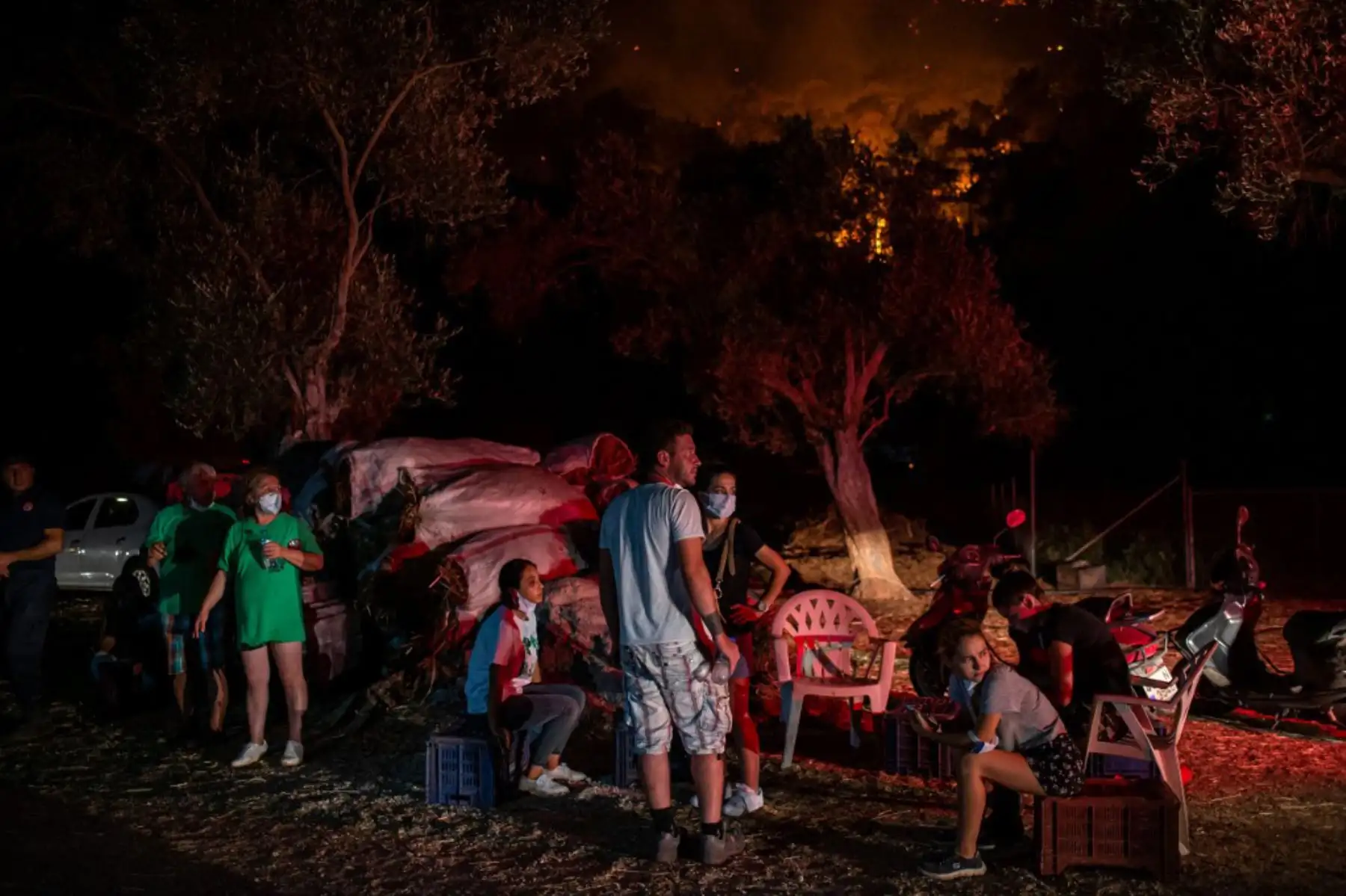 Damnificados por los incendios forestales en el área rural de Marmaris, distrito de Mugla, Turquía.

Foto: AFP