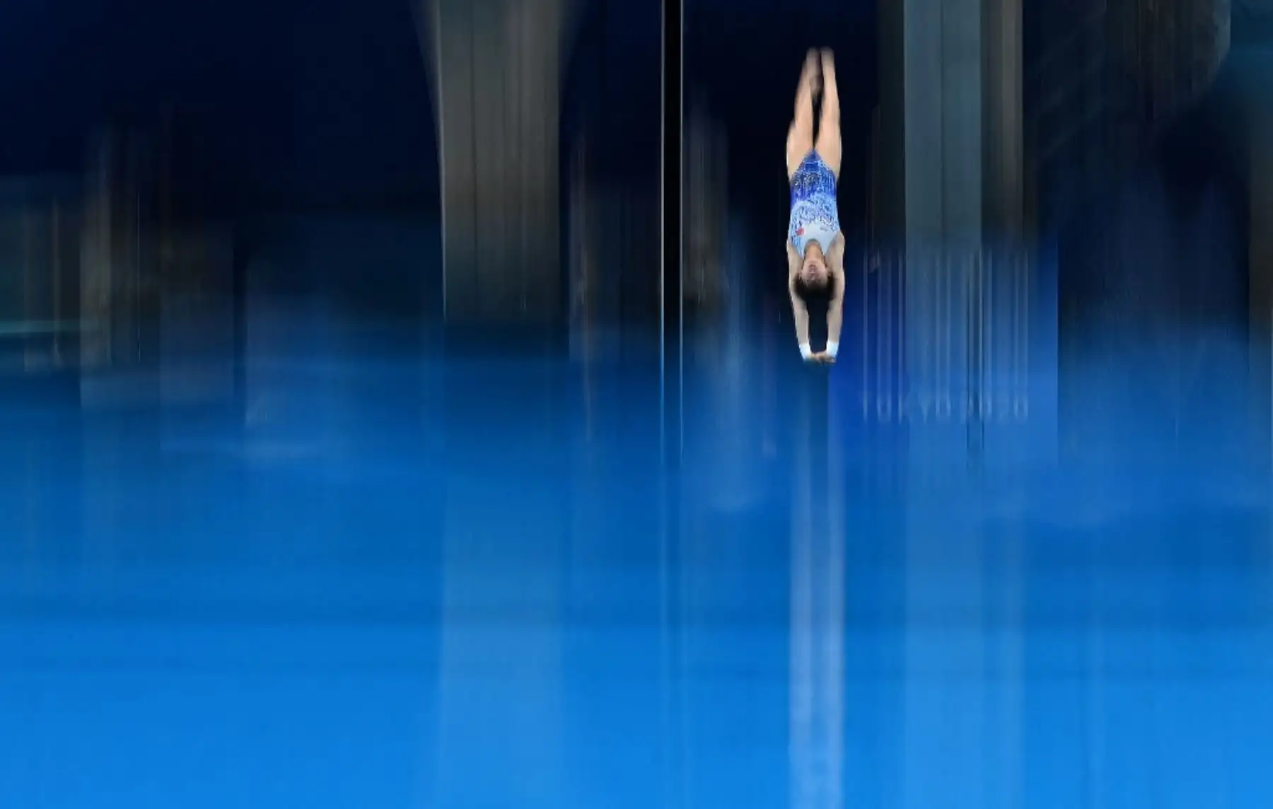 La china Chen Yuxi compite en la ronda preliminar del evento femenino de clavados durante los Juegos Olímpicos de Tokio 2020. Foto: AFP