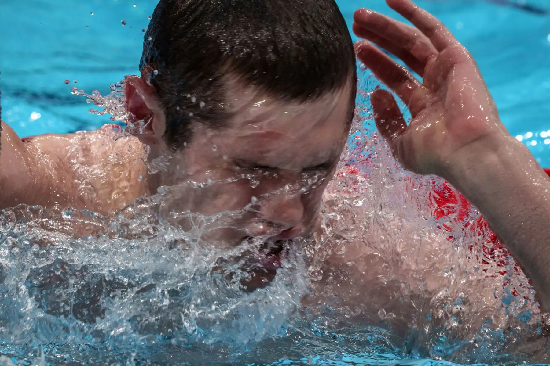 La británica Reece Dunn reacciona después de una eliminatoria por el evento de natación masculina de 100 metros mariposa  en los Juegos Paralímpicos de Tokio 2020.
Foto: AFP