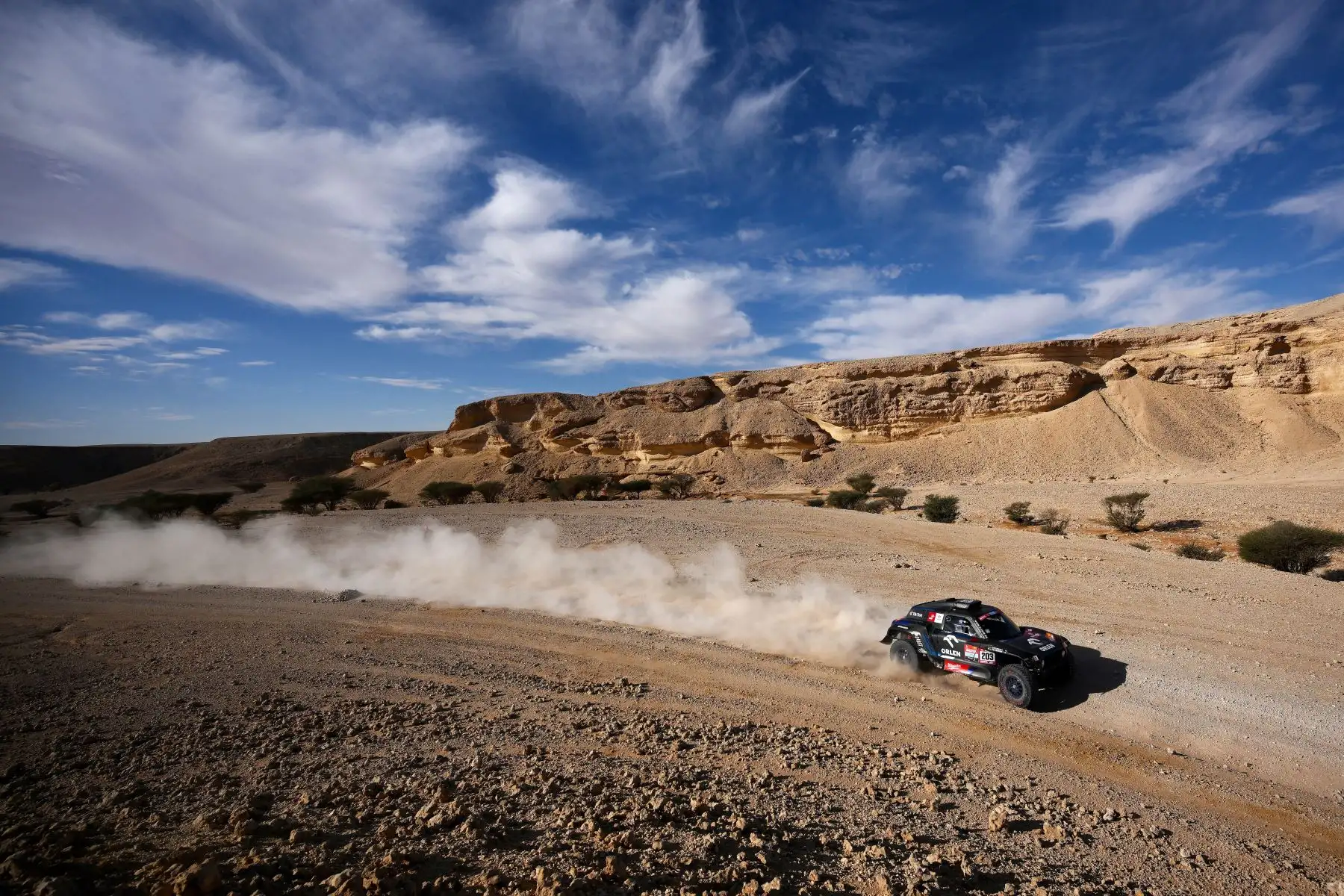 El piloto de Mini, Jakub Przygonski de Polonia y su copiloto Timo Gottschalk de Alemania compiten durante la etapa 6 del Dakar 2021 cerca de la capital de Arabia Saudita, Riad. Foto: AFP