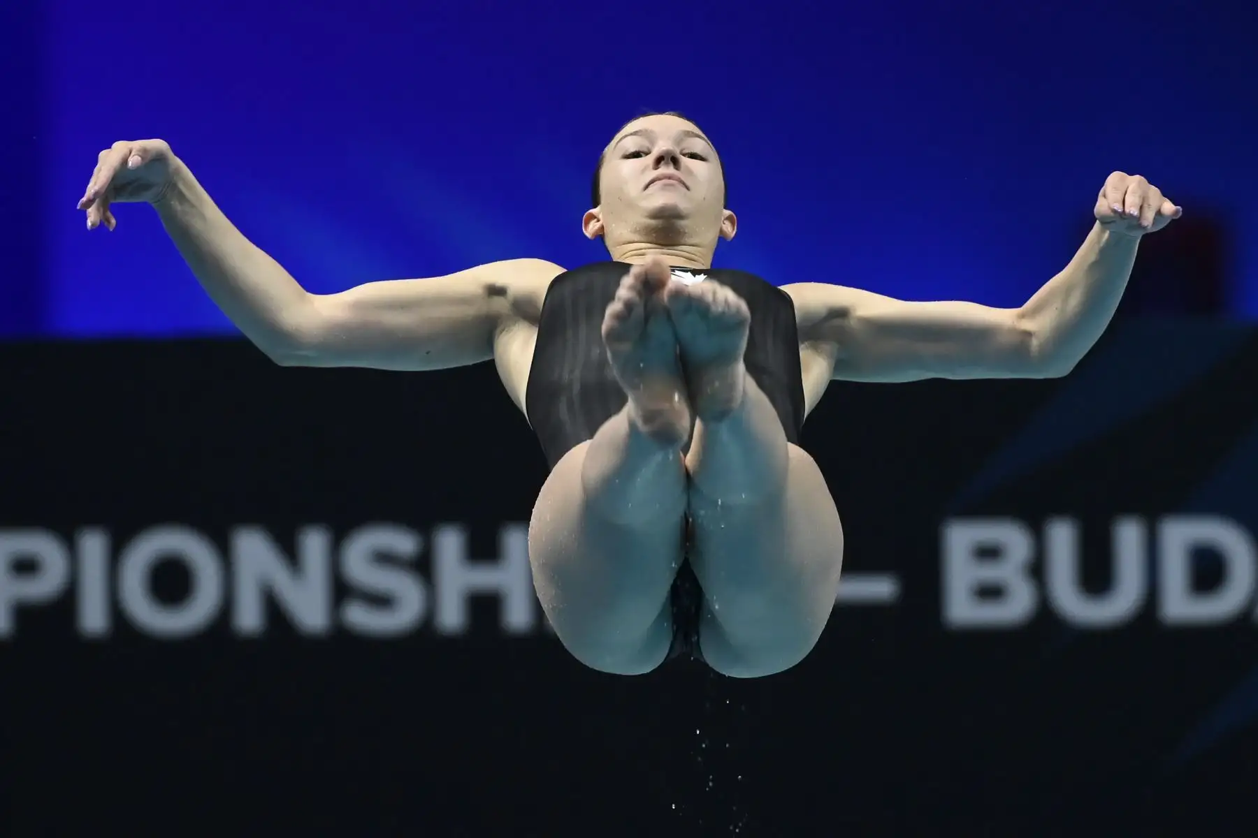 Margo Erlam de Canadá compite en la final de trampolín de salto de 1 m femenino del XIX Campeonato Mundial FINA en Duna Arena en Budapest, Hungría.
Foto: EFE