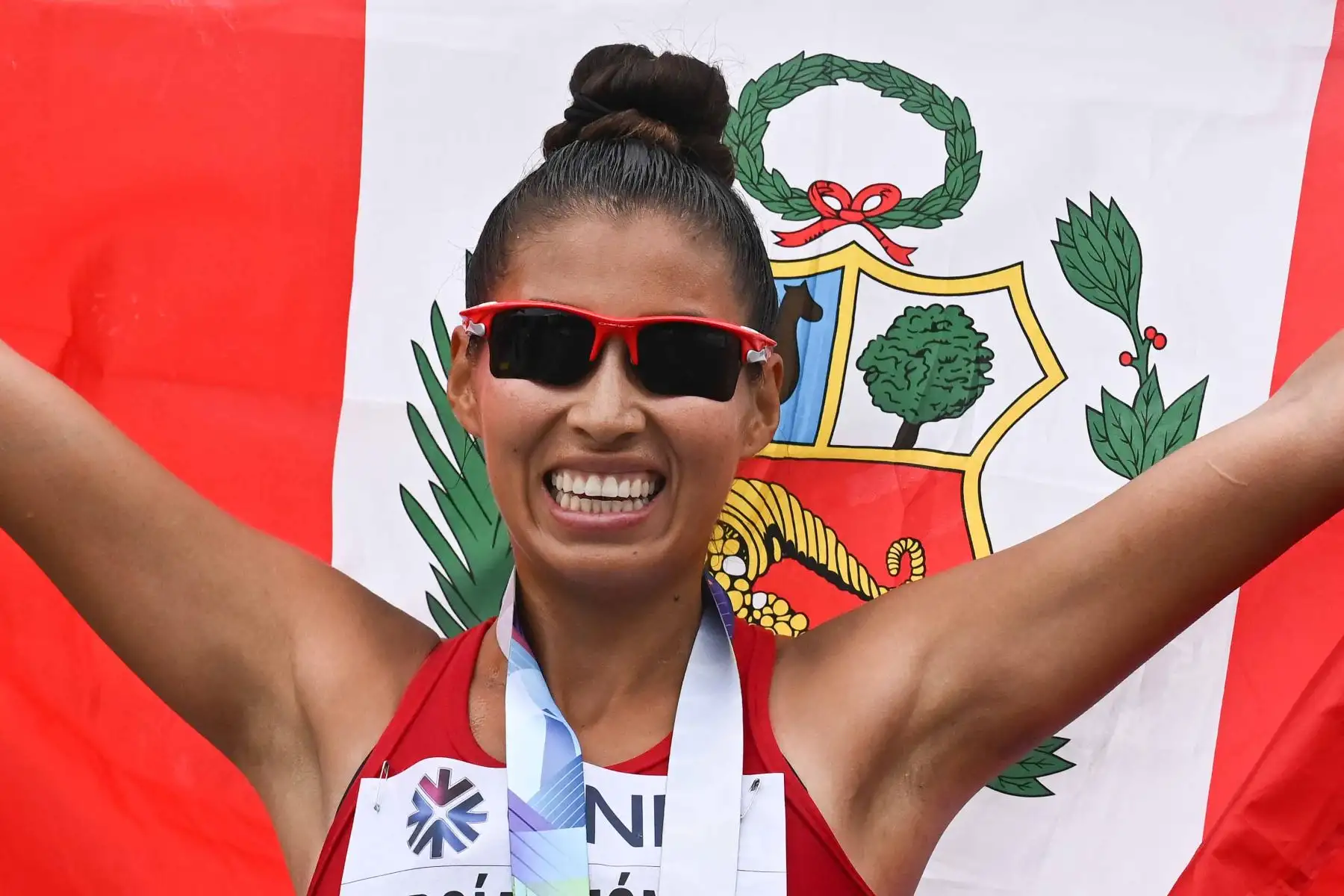Fotografía de archivo. Kimberly Garcia León, del equipo de Perú, gana la final de carrera de 35 kilómetros de mujeres en el Campeonato Mundial de Atletismo en Oregon.
Foto: AFP