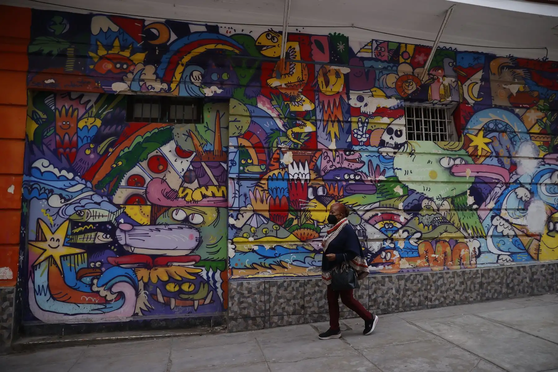 Recorrido turístico en el Callao, grafitis que adornan el pasaje de la salsa. Foto: ANDINA/Melina Mejía