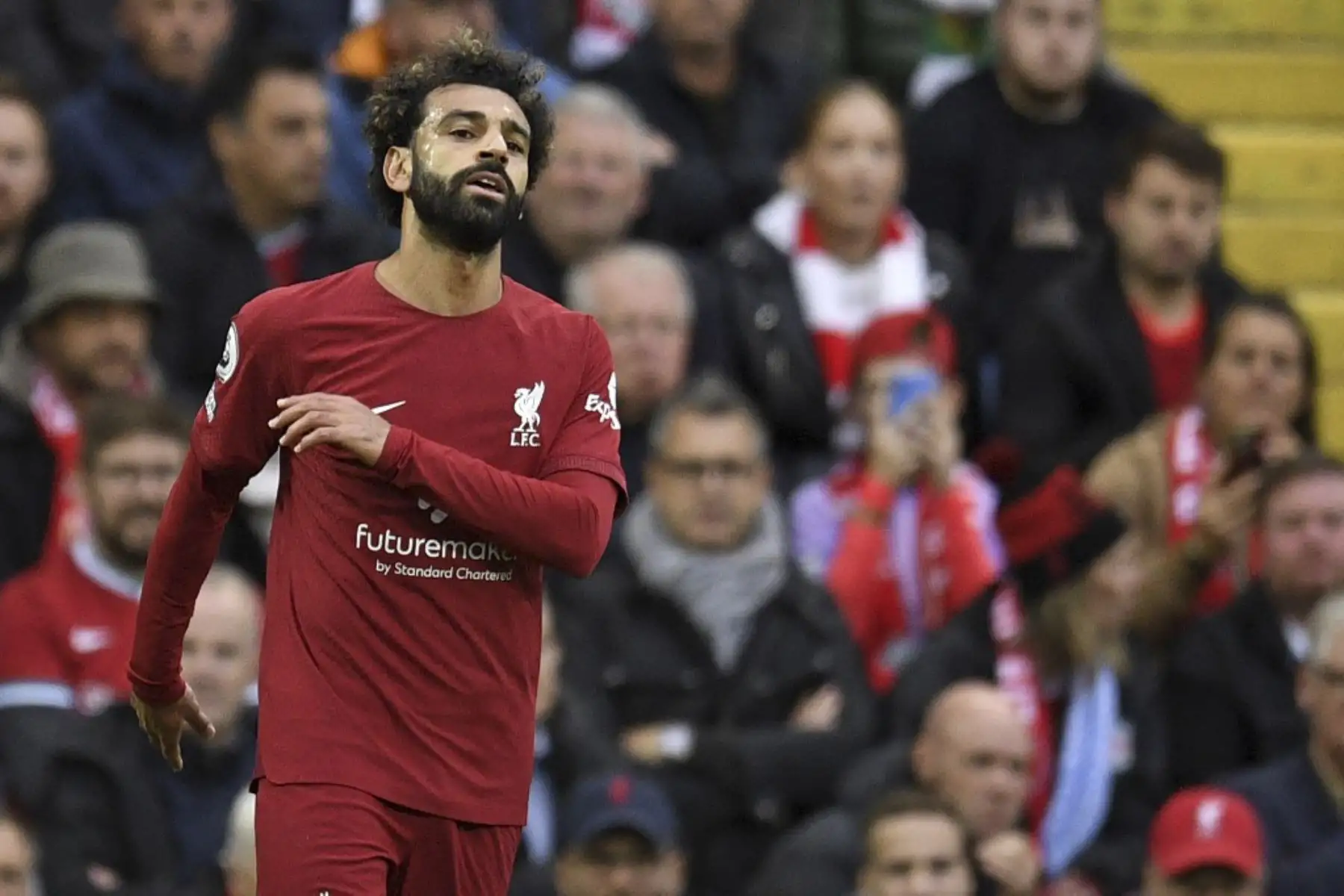 El delantero egipcio del Liverpool Mohamed Salah reacciona durante el partido de fútbol de la Premier League inglesa entre el Liverpool y el Manchester City en Anfield en Liverpool.

Foto: AFP