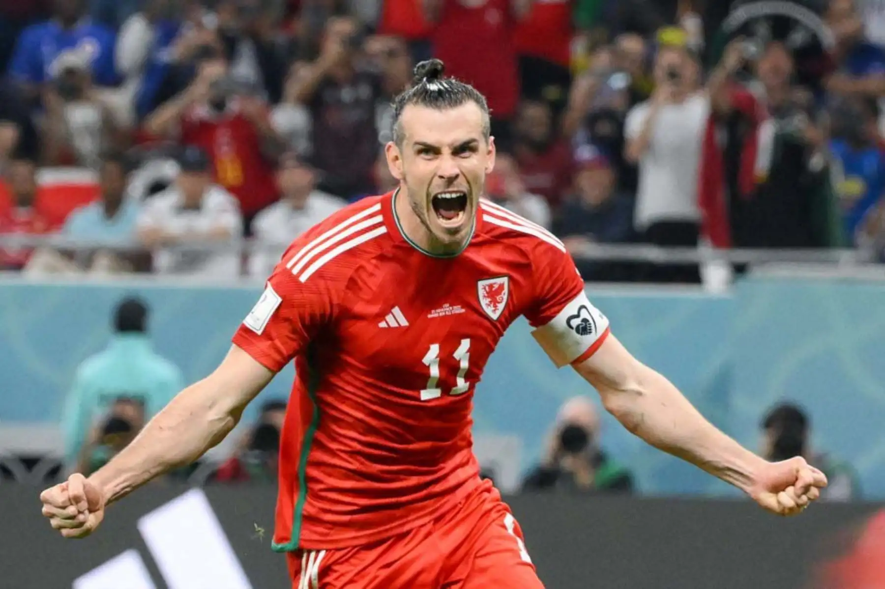 Gareth Bale, celebra marcar el primer gol de su equipo durante el partido de fútbol del Grupo B de la Copa Mundial. Foto: AFP