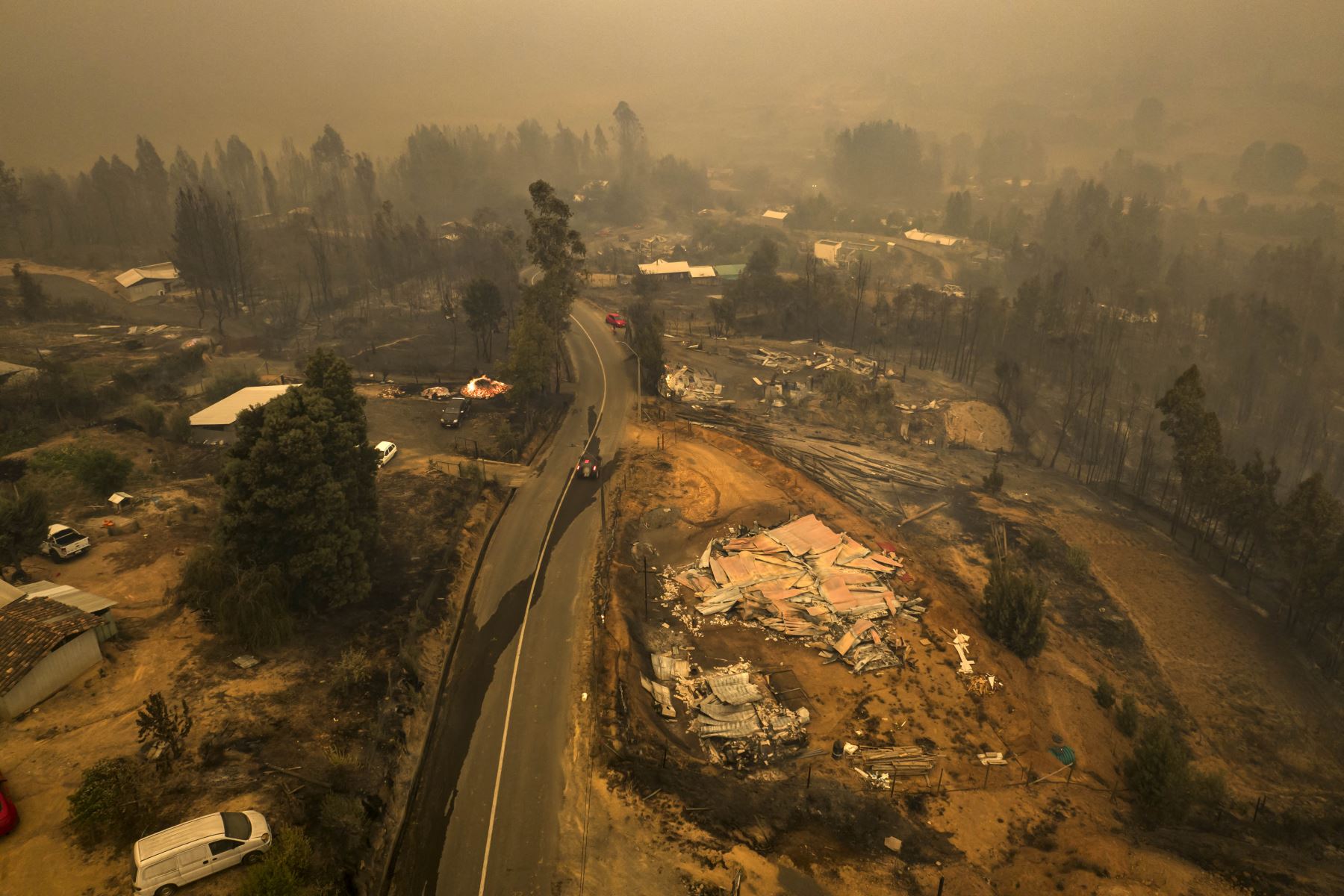 Vista aérea de los campos quemados durante un incendio en Santa Juana, provincia de Concepción, Chile el 3 de febrero de 2023.

Foto: AFP