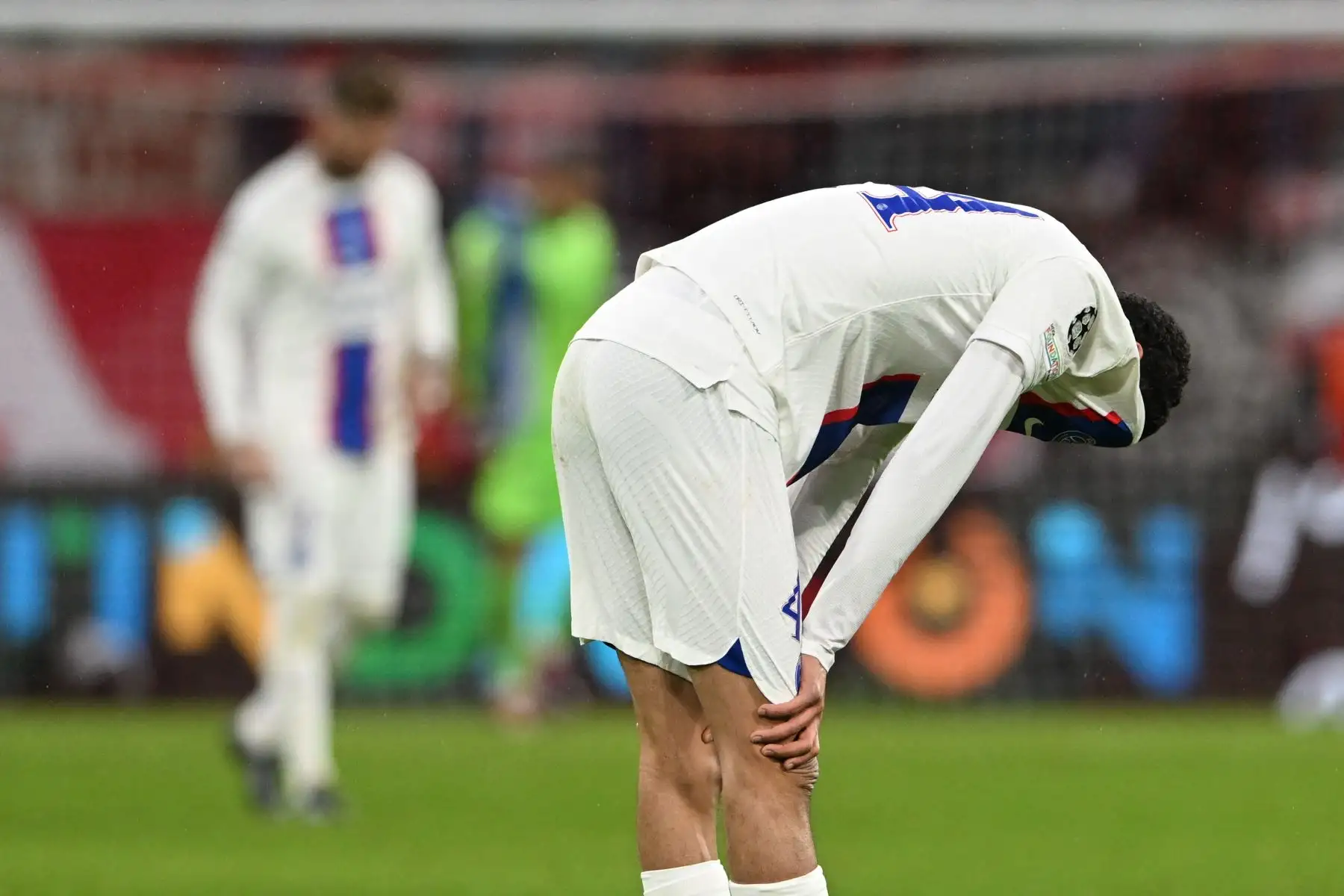 El delantero francés del Paris Saint-Germain Hugo Ekitike reacciona durante los octavos de final de la Liga de Campeones de la UEFA, partido de fútbol de vuelta FC Bayern Munich vs Paris Saint-Germain FC en Munich, sur de Alemania, el 8 de marzo de 2023.
Foto: AFP