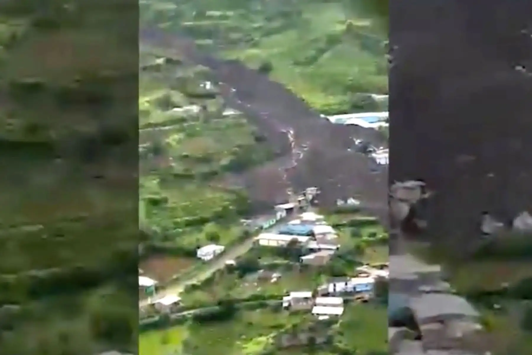 La Policía Nacional del Perú envió al centro poblado La Perla Chaupis, en la provincia de Huaral, dos helicópteros y un equipo especializado en búsqueda y rescate con el fin de ubicar a las personas desaparecidas tras el deslizamiento del cerro que sepultó varios predios y el deceso de una residente. Foto: captura TV.